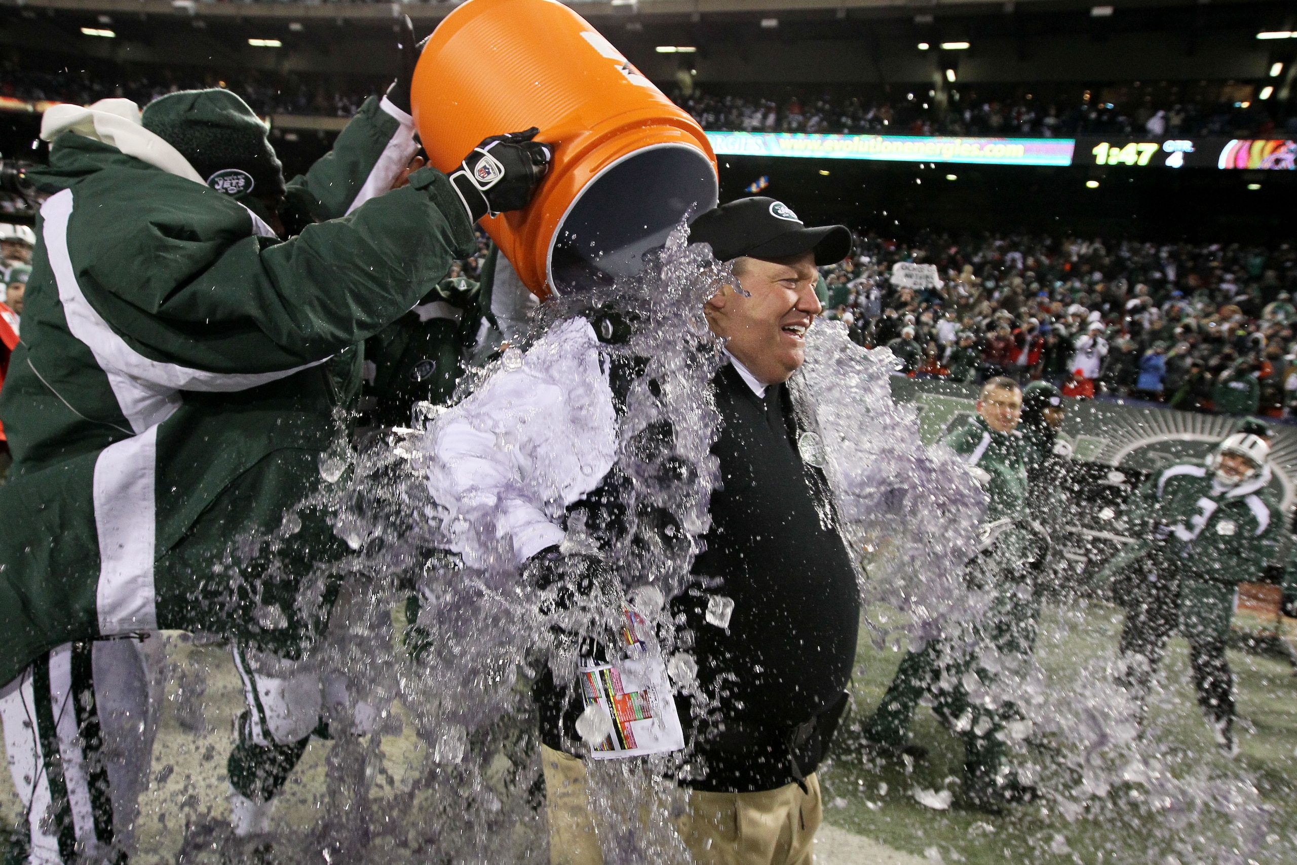EAST RUTHERFORD, NJ - JANUARY 03:  Rex Ryan, Head Coach of the New York Jets, has Gatorade dumped on him by players at the end of the fourth quarter in celebration of their 37-0 victory over the Cincinnati Bengals at Giants Stadium on January 3, 2010 in E