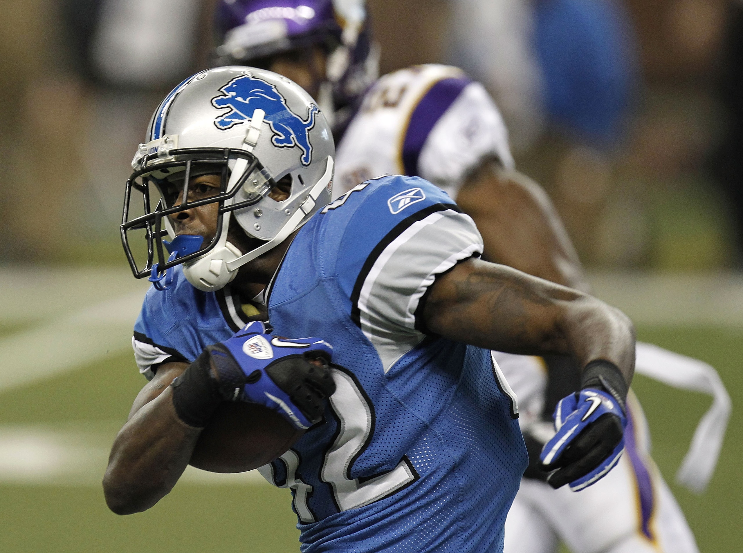 DETROIT, MI - JANUARY 02:  Amari Spievey #42 of the Detroit Lions returns a second quarter interception while playing the Minnesota Vikings at Ford Field on January 2, 2011 in Detroit, Michigan.  (Photo by Gregory Shamus/Getty Images)