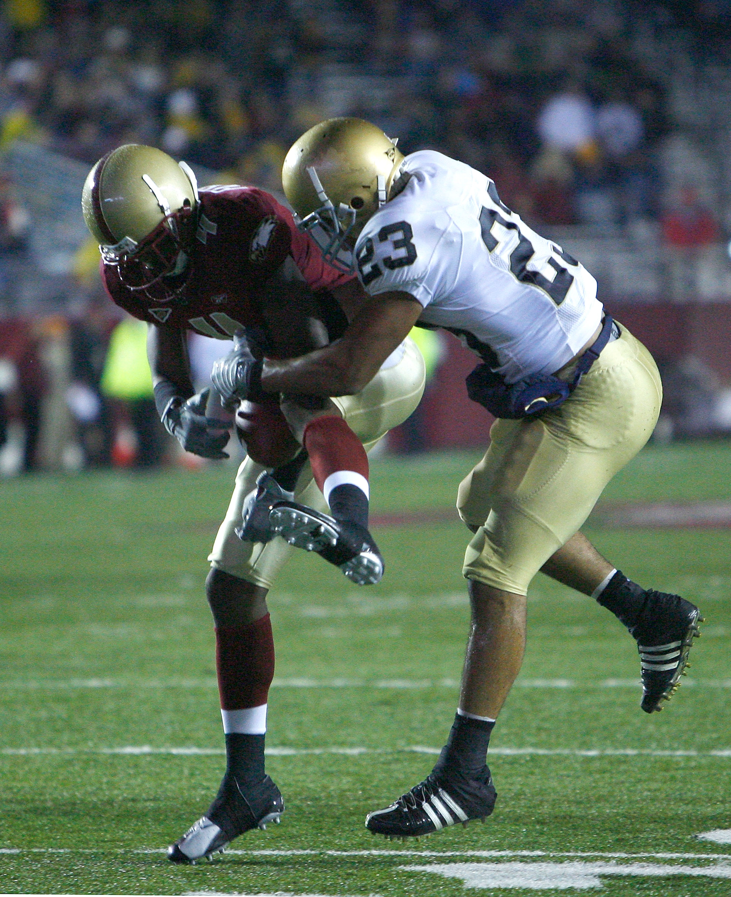 CHESTNUT HILL, MA - NOVEMBER 8: Donnie Fletcher #4 of the Boston College Eagles intercepts a pass intended for Golden Tate #23 of the Notre Dame Fighting Irish during a game against the Boston College Eagles on November 8, 2008 at Alumni Stadium in Chestn