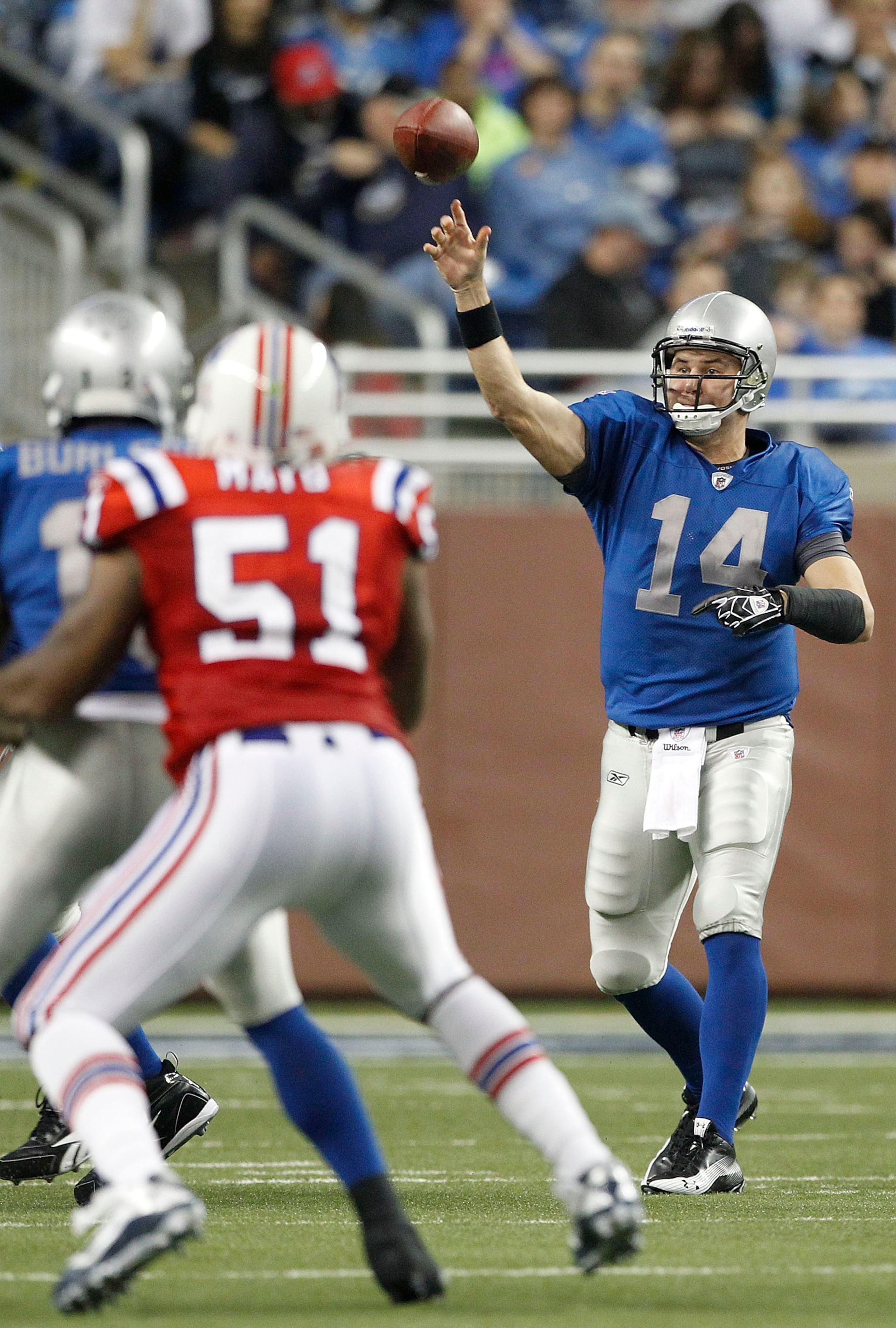 DETROIT - NOVEMBER 25: Shaun Hill #14 of the Detroit Lions drops back to pass during the game against the New England Patriots at Ford Field on November 25, 2010 in Detroit, Michigan. New England defeated Detroit 45-24.  (Photo by Leon Halip/Getty Images)