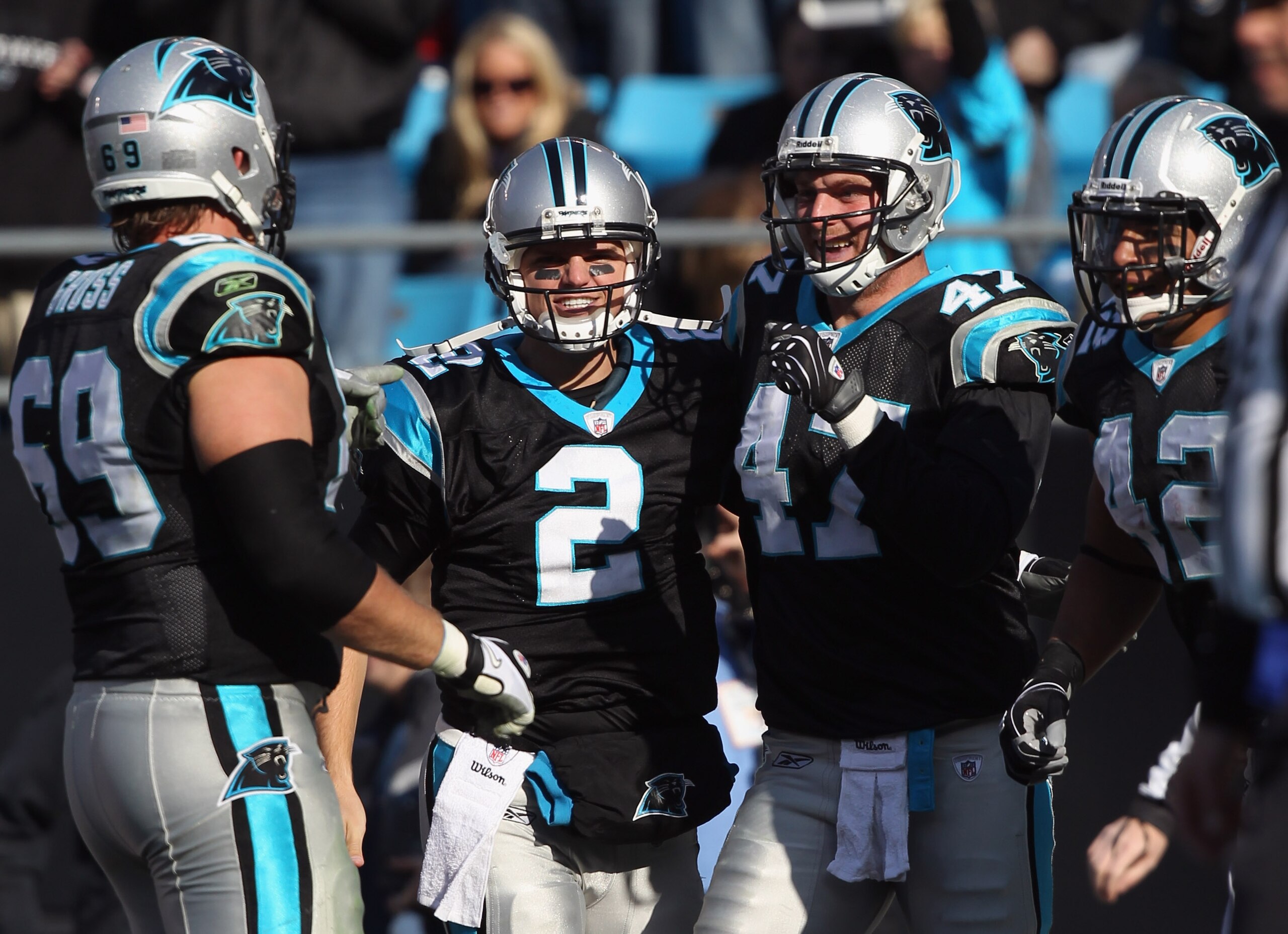 CHARLOTTE, NC - DECEMBER 19: Teammates Jimmy Clausen #2 and Jeff King #47 of the Carolina Panthers celebrate after a touchdown by King during their game against the Arizona Cardinals at Bank of America Stadium on December 19, 2010 in Charlotte, North Car CHARLOTTE, NC - DECEMBER 19: Teammates Jimmy Clausen #2 and Jeff King #47 of the Carolina Panthers celebrate after a touchdown by King during their game against the Arizona Cardinals at Bank of America Stadium on December 19, 2010 in Charlotte, North Car