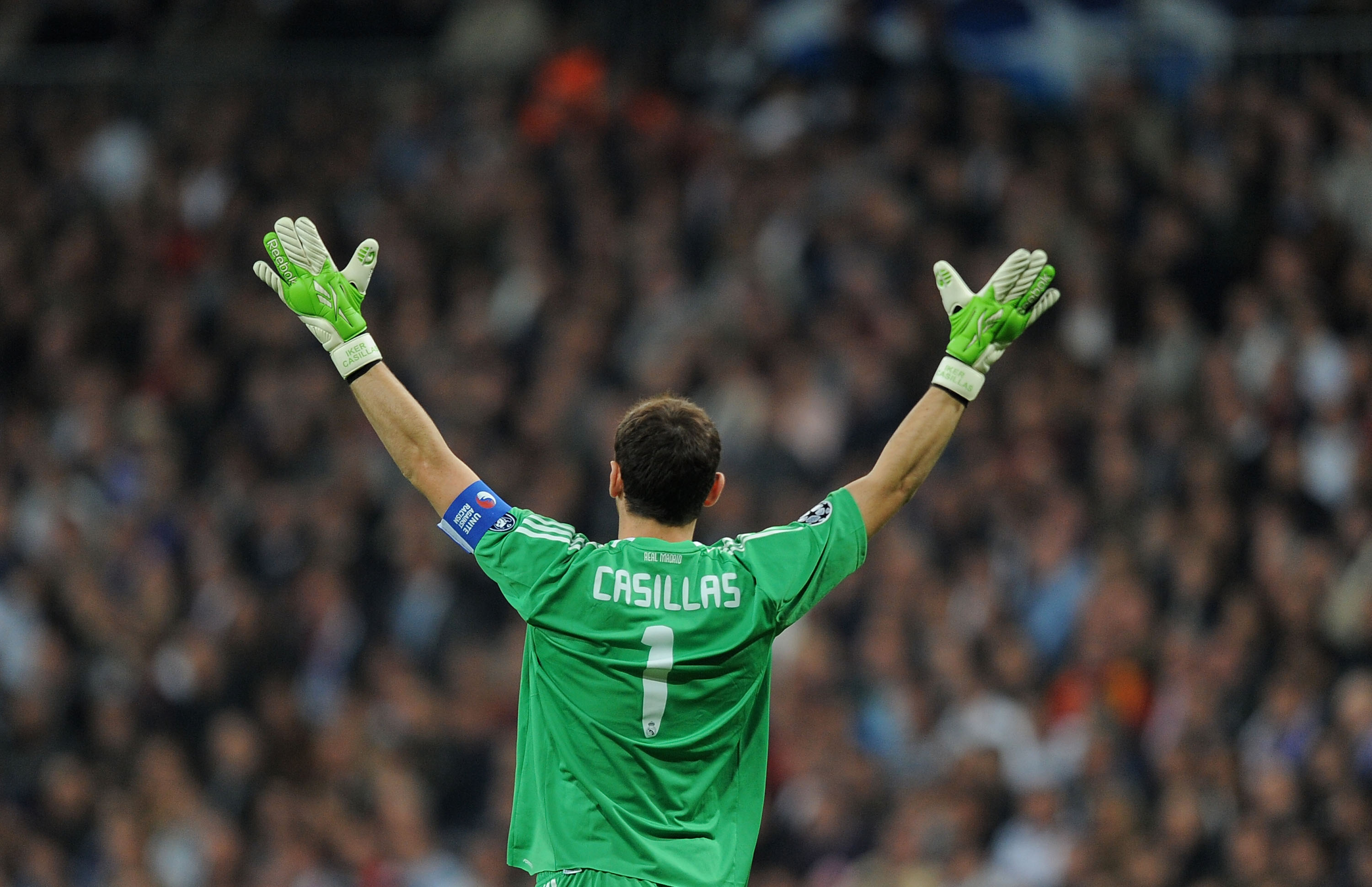 MADRID, SPAIN - OCTOBER 19:  Iker Casillas of Real Madrid urges on his side during the UEFA Champions League Group G match between Real Madrid and AC Milan at Estadio Santiago Bernabeu on October 19, 2010 in Madrid, Spain.  (Photo by Denis Doyle/Getty Ima