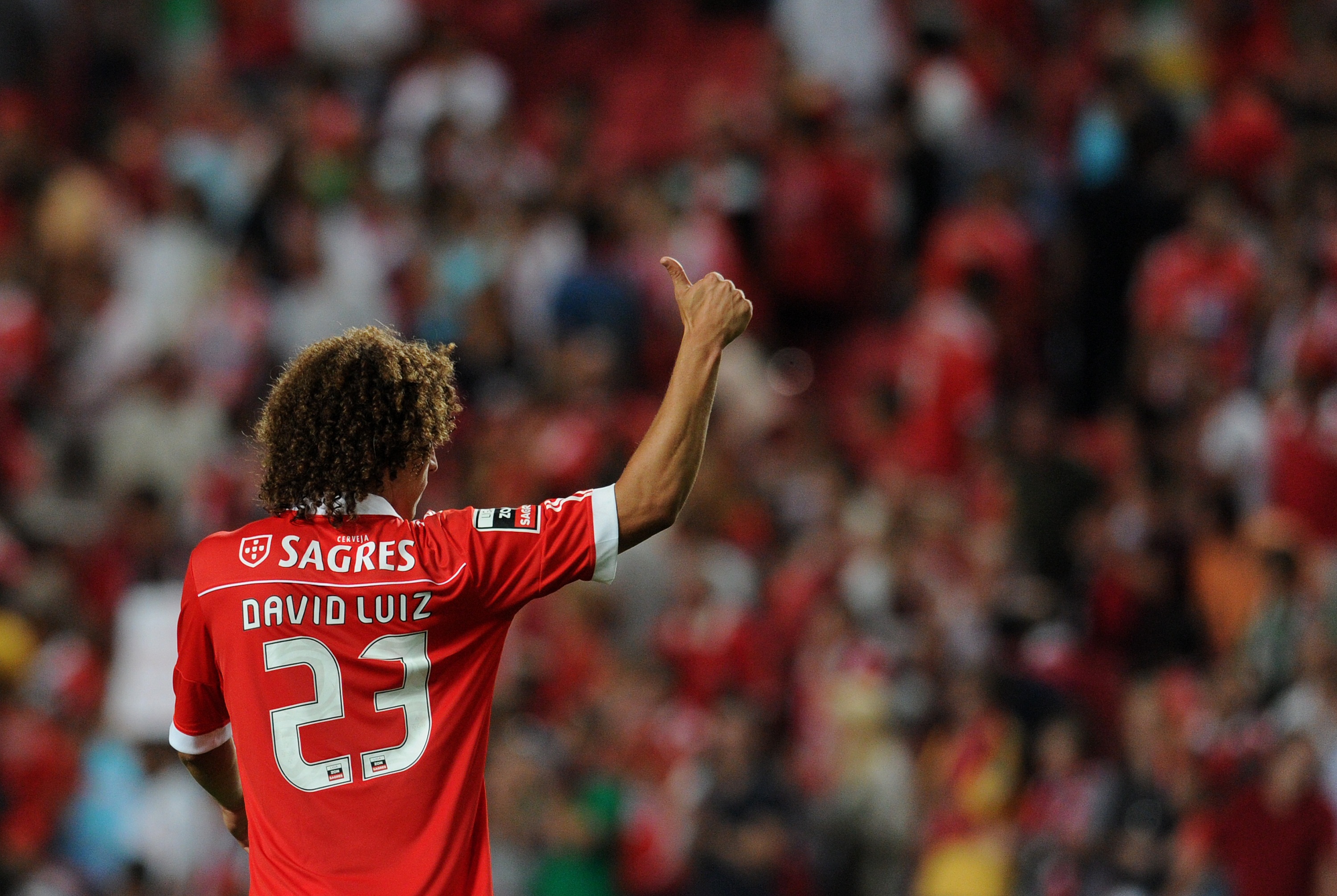 LISBON, PORTUGAL - AUGUST 28:  David Luiz of Benfica gives a thumbs up to the fans during the Portuguese Liga match between Vitoria Setubal and Benfica at Luz Stadium on August 28, 2010 in Lisbon, Portugal.  (Photo by Patricia de Melo/EuroFootball/Getty I