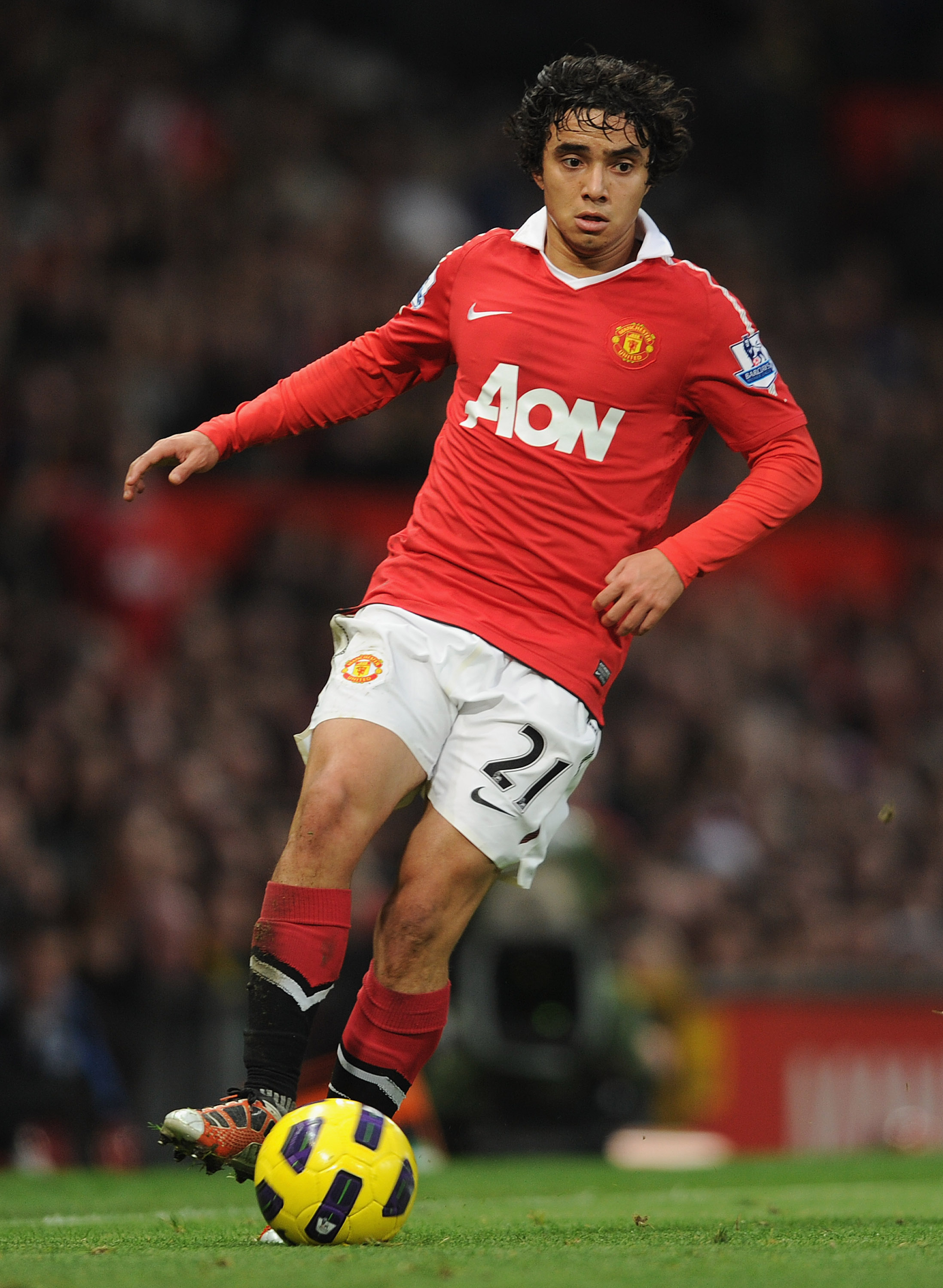 MANCHESTER, ENGLAND - NOVEMBER 20: Rafael Da Silva of Manchester United plays the ball during the Barclays Premier League match between Manchester United and Wigan Athletic at Old Trafford on November 20, 2010 in Manchester, England.  (Photo by Michael Re