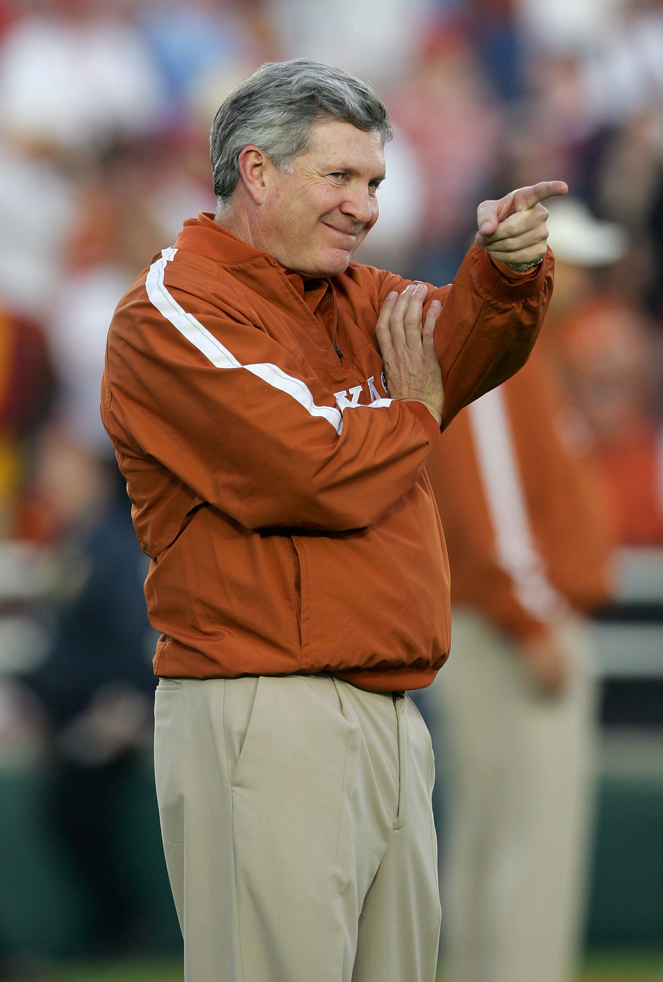 PASADENA, CA - JANUARY 04: Head coach Mack Brown of the Texas Longhorns smiles during warmups before the start of the BCS National Championship Rose Bowl Game against the USC Trojans at the Rose Bowl on January 4, 2006 in Pasadena, California. (Photo by PASADENA, CA - JANUARY 04: Head coach Mack Brown of the Texas Longhorns smiles during warmups before the start of the BCS National Championship Rose Bowl Game against the USC Trojans at the Rose Bowl on January 4, 2006 in Pasadena, California. (Photo by