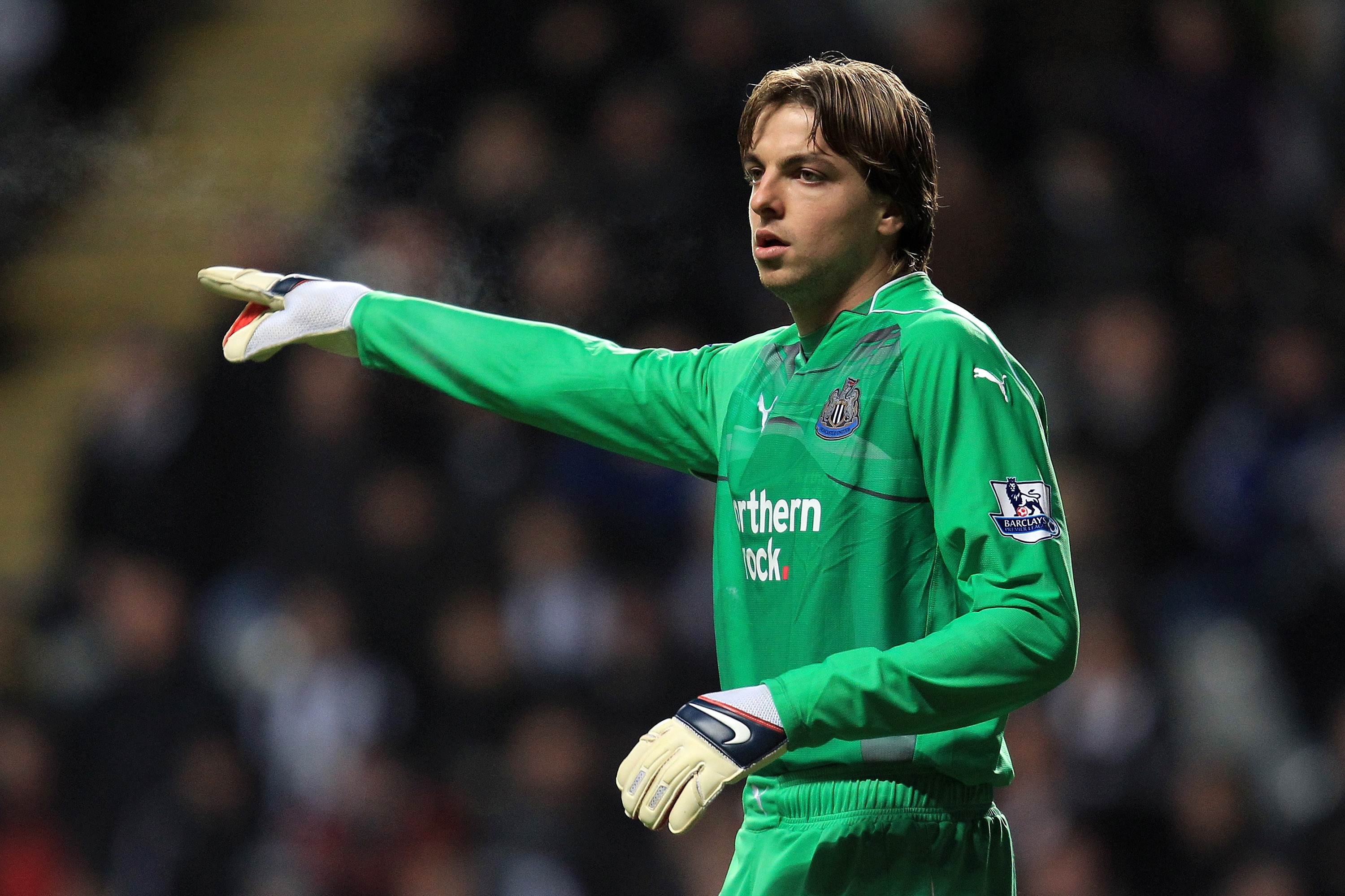 NEWCASTLE UPON TYNE, ENGLAND - DECEMBER 11:  Tim Krul of Newcastle United gestures during the Barclays Premier League match between Newcastle United and Liverpool at St James' Park on December 11, 2010 in Newcastle, England.  (Photo by Mark Thompson/Getty