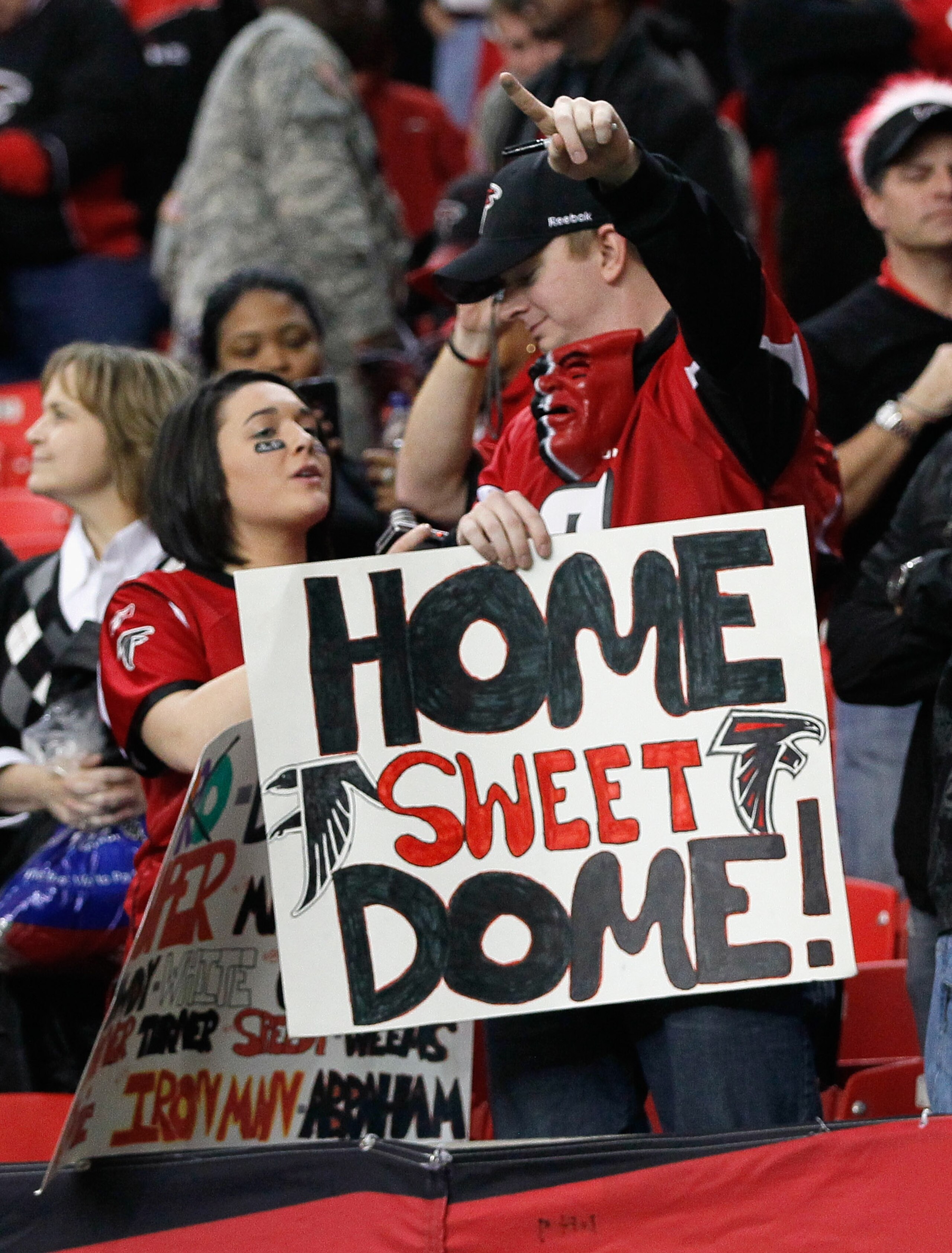 ATLANTA, GA - JANUARY 02:  Fans of the Atlanta Falcons hold up a sign during the game against the Carolina Panthers at Georgia Dome on January 2, 2011 in Atlanta, Georgia.  (Photo by Kevin C. Cox/Getty Images)