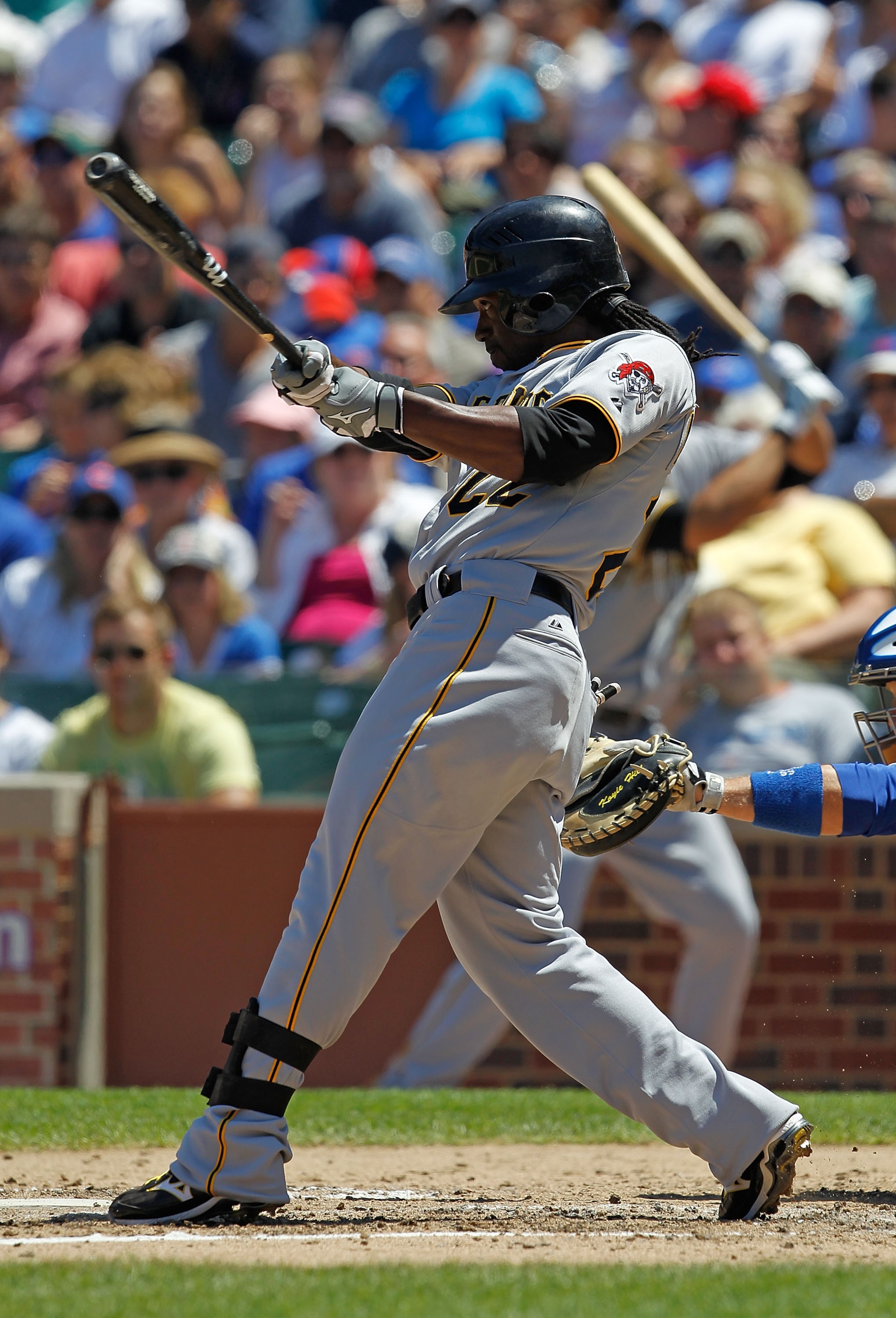 CHICAGO - JUNE 30: Andrew McCutchen #22 of the Pittsburgh Pirates hits the ball against the Chicago Cubs at Wrigley Field on June 30, 2010 in Chicago, Illinois. The Pirates defeated the Cubs 2-0. (Photo by Jonathan Daniel/Getty Images)