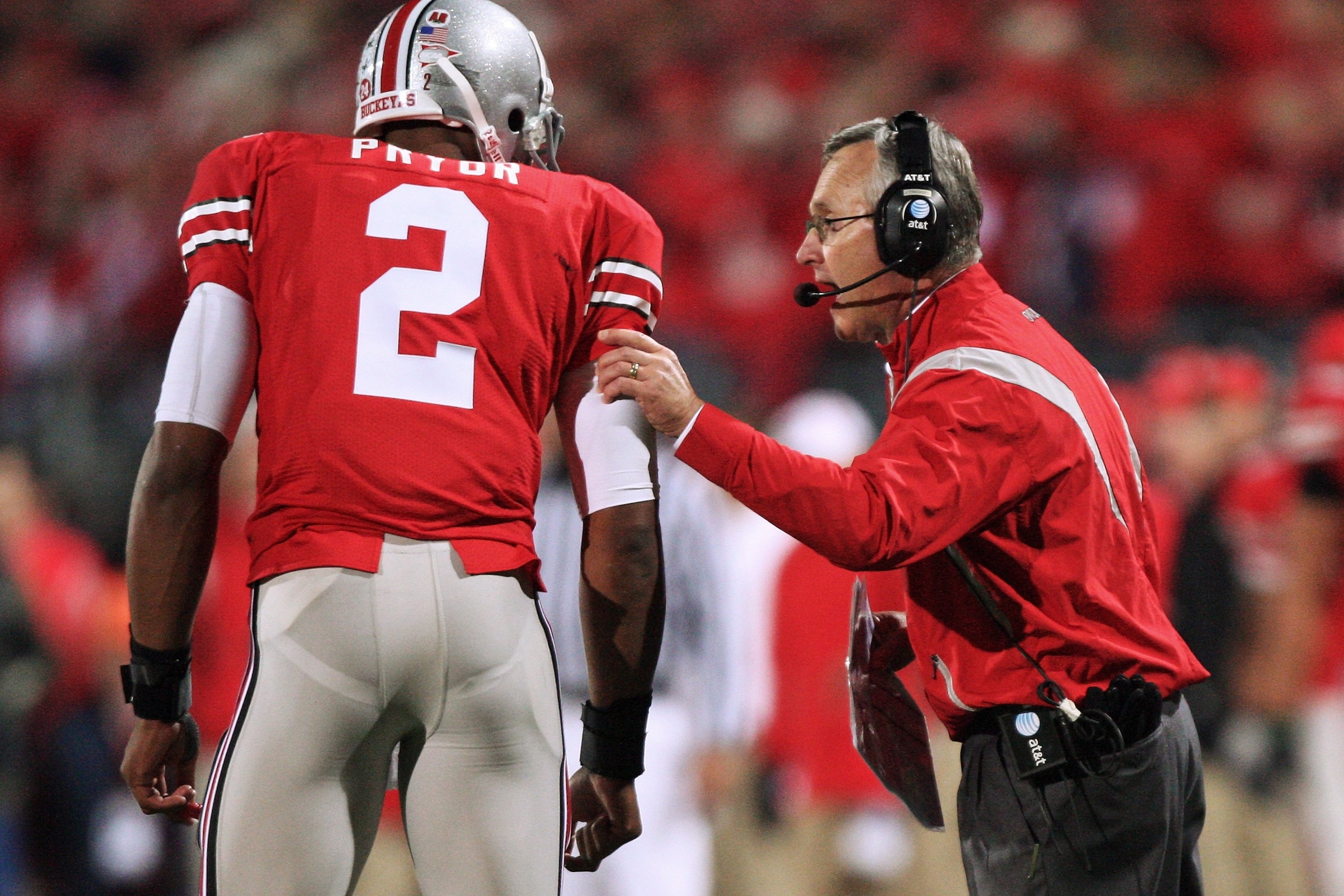 COLUMBUS, OH - OCTOBER 25: Ohio State Buckeyes head coach Jim Tressell instructs his quarterback Terrell Pryor #2 during the game against the Penn State Nittany Lions on October 25, 2008 at Ohio Stadium in Columbus, Ohio.  (Photo by Jamie Sabau/Getty Imag