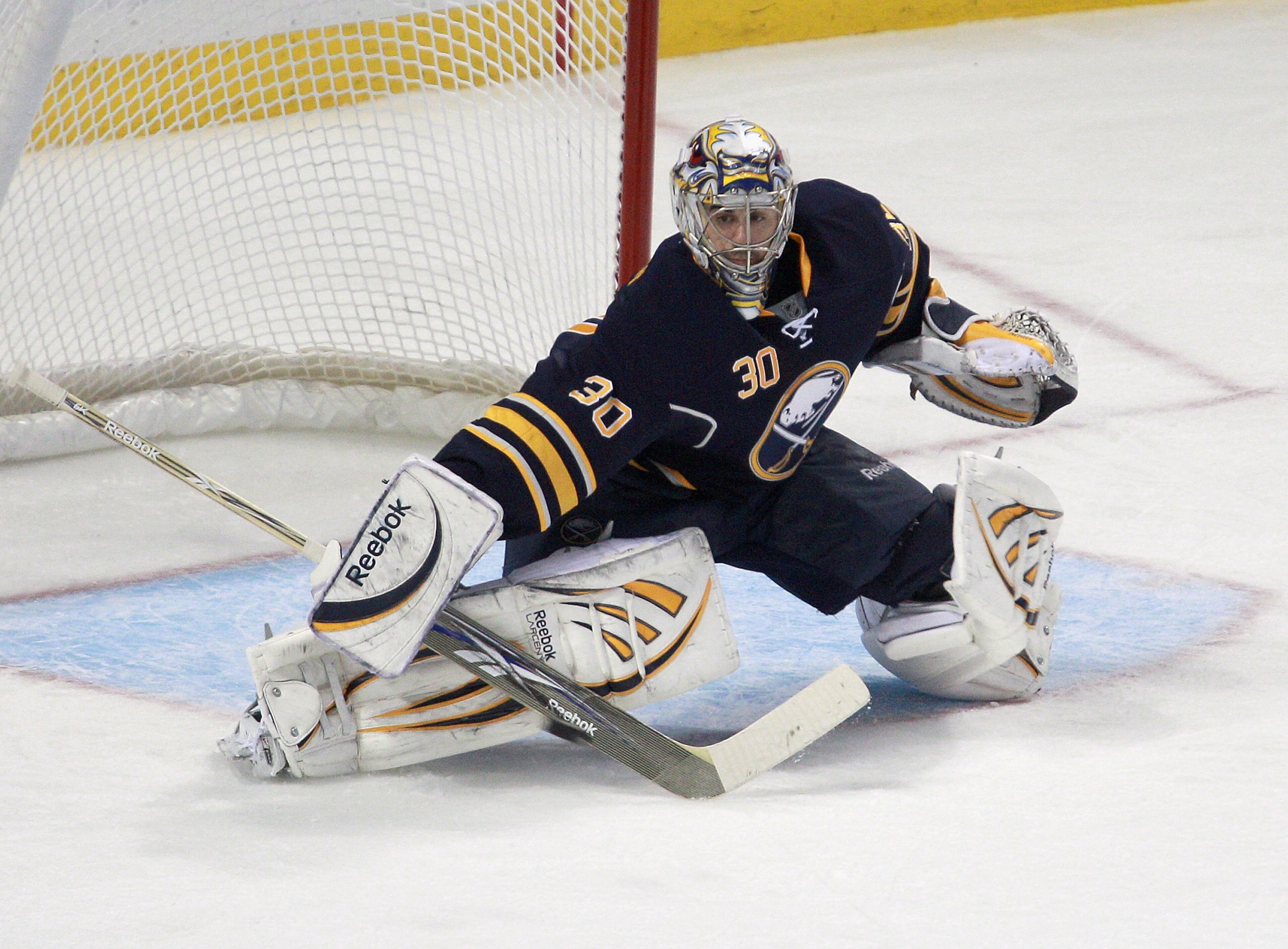 BUFFALO, NY - DECEMBER 23: Ryan Miller #30 of the Buffalo Sabres dflects a shot against the Florida Panthers at HSBC Arena on December 23, 2010 in Buffalo, New York. Florida won 4-3.  (Photo by Rick Stewart/Getty Images)