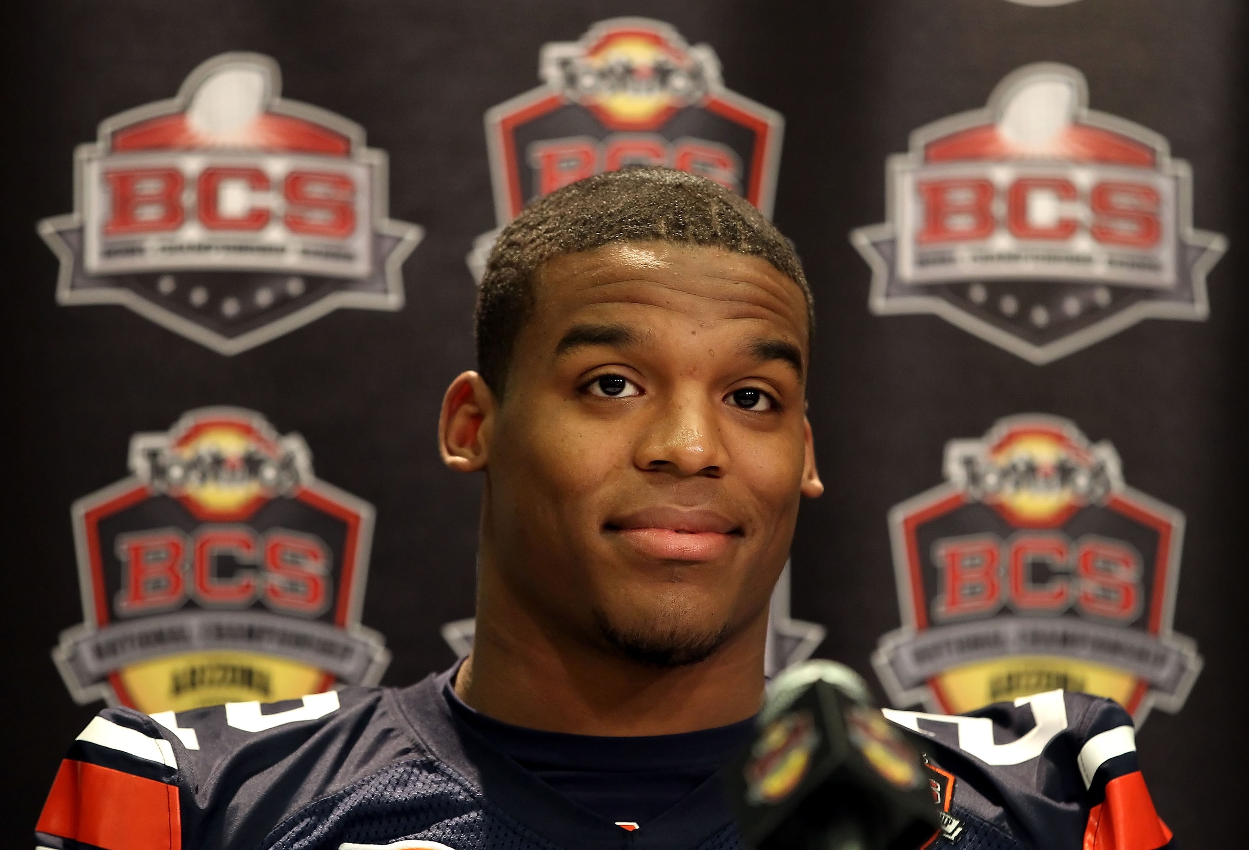 SCOTTSDALE, AZ - JANUARY 07:  Quarterback Cam Newton #2 of the Auburn Tigers talks with the media during Media Day for the Tostitos BCS National Championship Game at the JW Marriott Camelback Inn on January 7, 2011 in Scottsdale, Arizona.  (Photo by Chris
