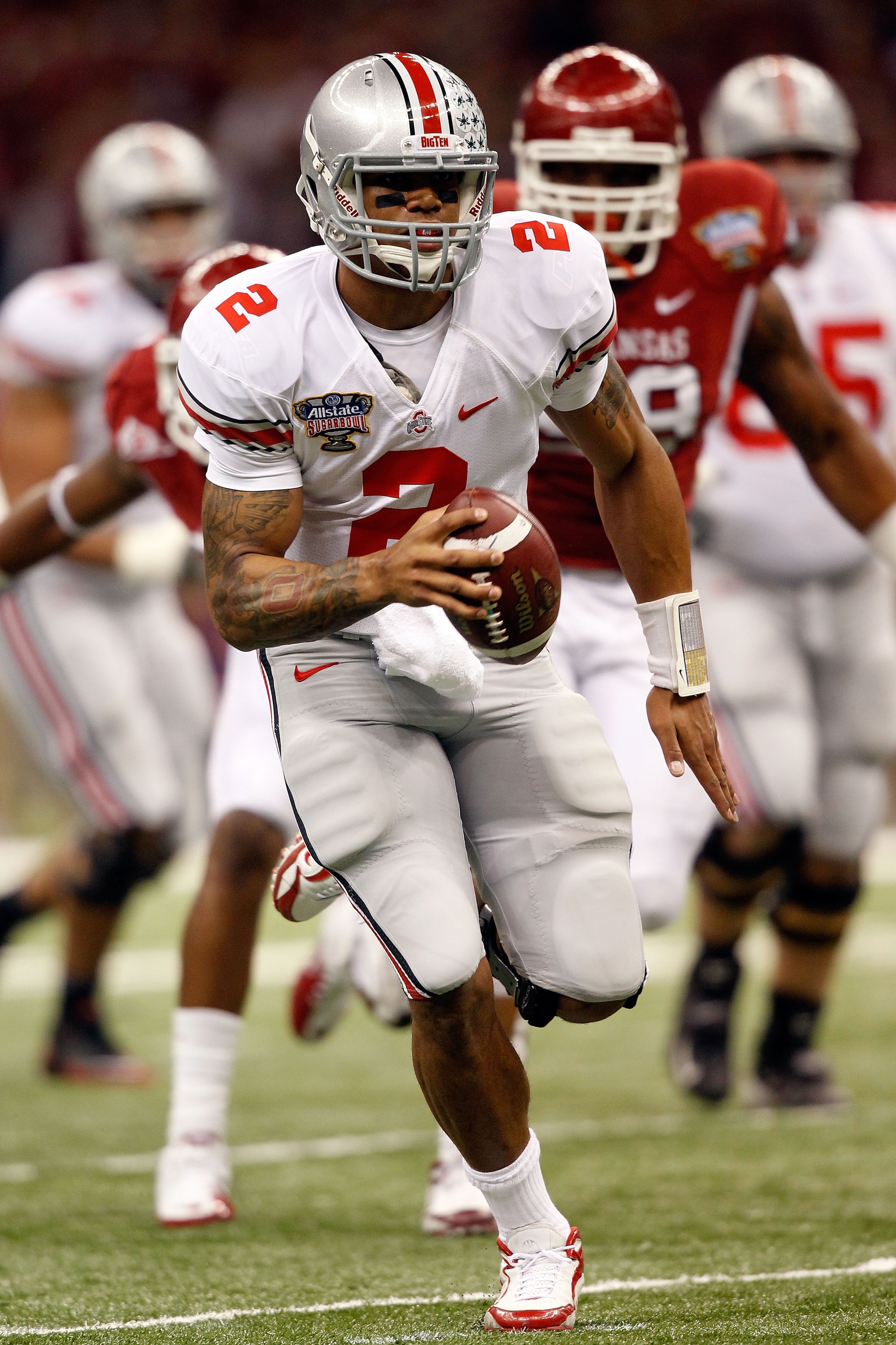 NEW ORLEANS, LA - JANUARY 04:  Terrelle Pryor #2 of the Ohio State Buckeyes runs with the football against the Arkansas Razorbacks in the first quarter during the Allstate Sugar Bowl at the Louisiana Superdome on January 4, 2011 in New Orleans, Louisiana.