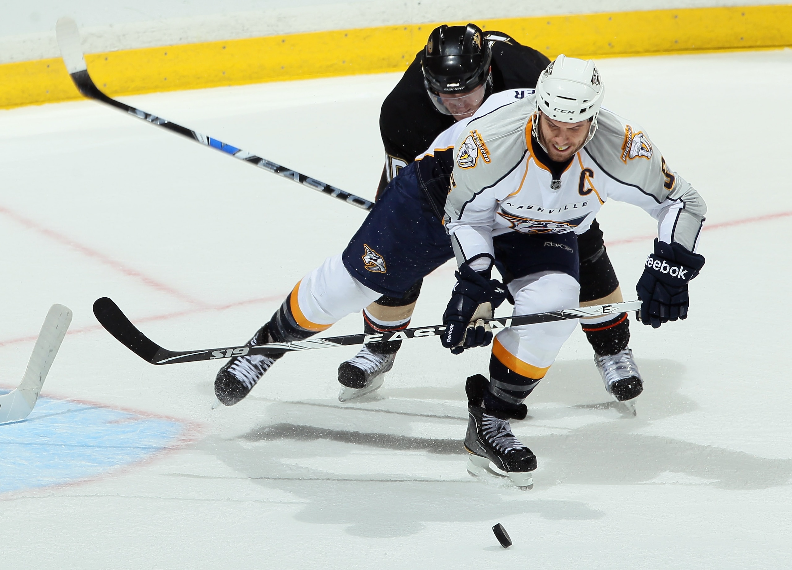 ANAHEIM, CA - JANUARY 05:  Shea Weber #6 of the Nashville Predators is pursued by Corey Perry #10 of the Anaheim Ducks in the third period at the Honda Center on January 5, 2011 in Anaheim, California. The Predators defeated the Ducks 4-1.  (Photo by Jeff