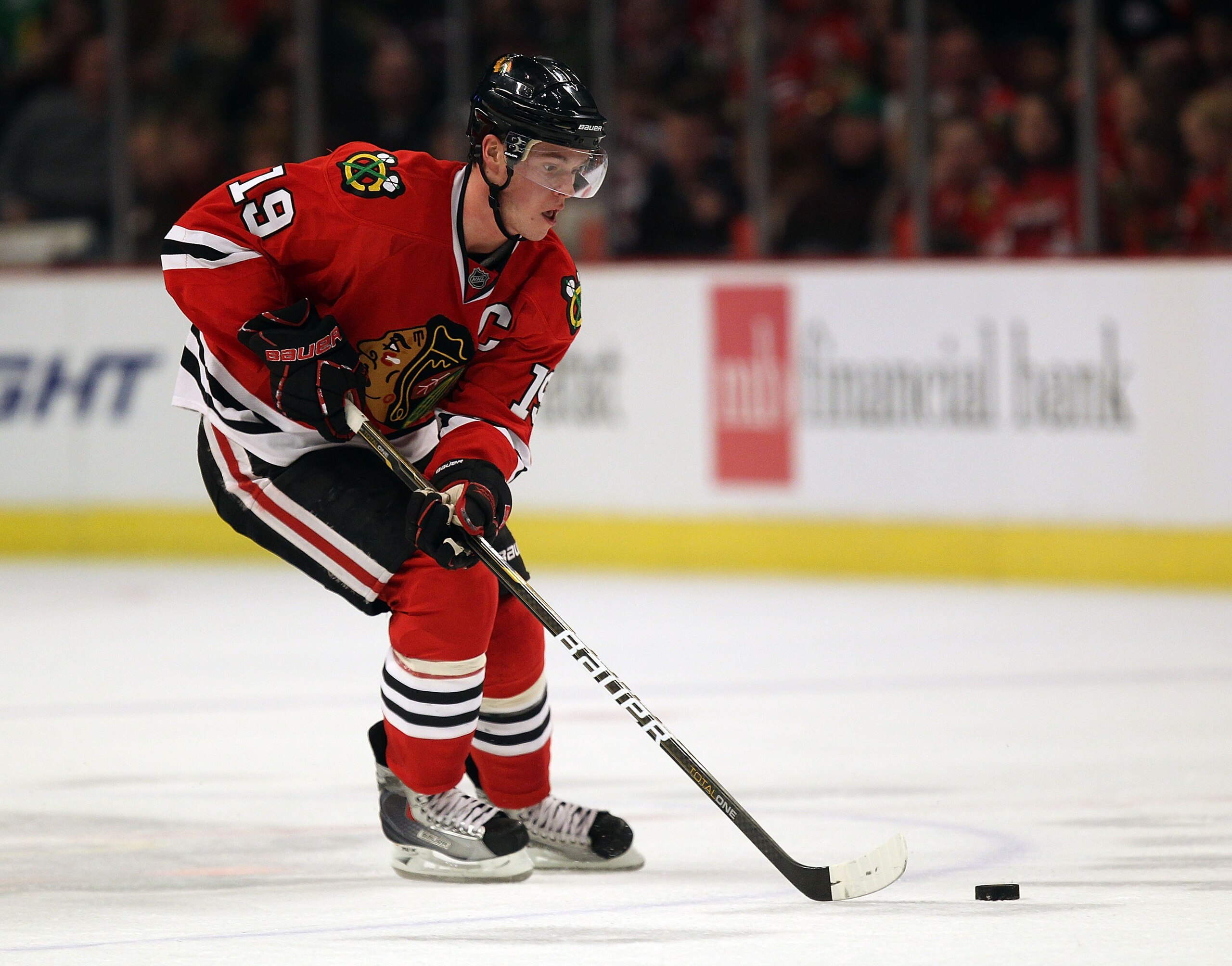 CHICAGO, IL - JANUARY 05: Jonathan Toews #19 of the Chicago Blackhawks controls the puck against the Dallas Stars at the United Center on January 5, 2011 in Chicago, Illinois. The Stars defeated the Blackhawks 4-2. (Photo by Jonathan Daniel/Getty Images)