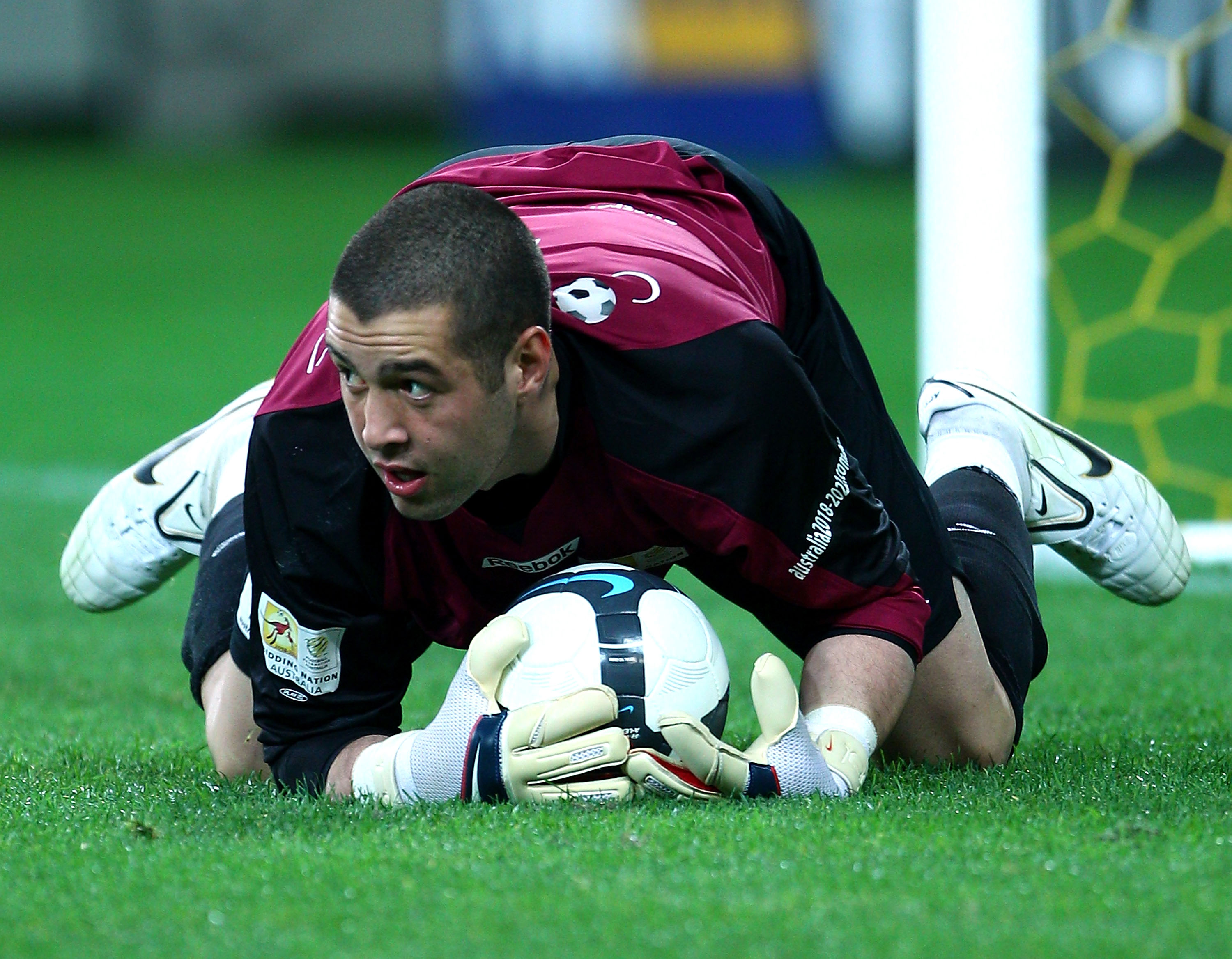 MELBOURNE, AUSTRALIA - MAY 14:  Dean Bouzanis of the Come Play XI makes a save during the Kevin Muscat Testimonial match between Melbourne Victory and the Come Play XI Squad at AAMI Park on May 14, 2010 in Melbourne, Australia.  (Photo by Mark Dadswell/Ge