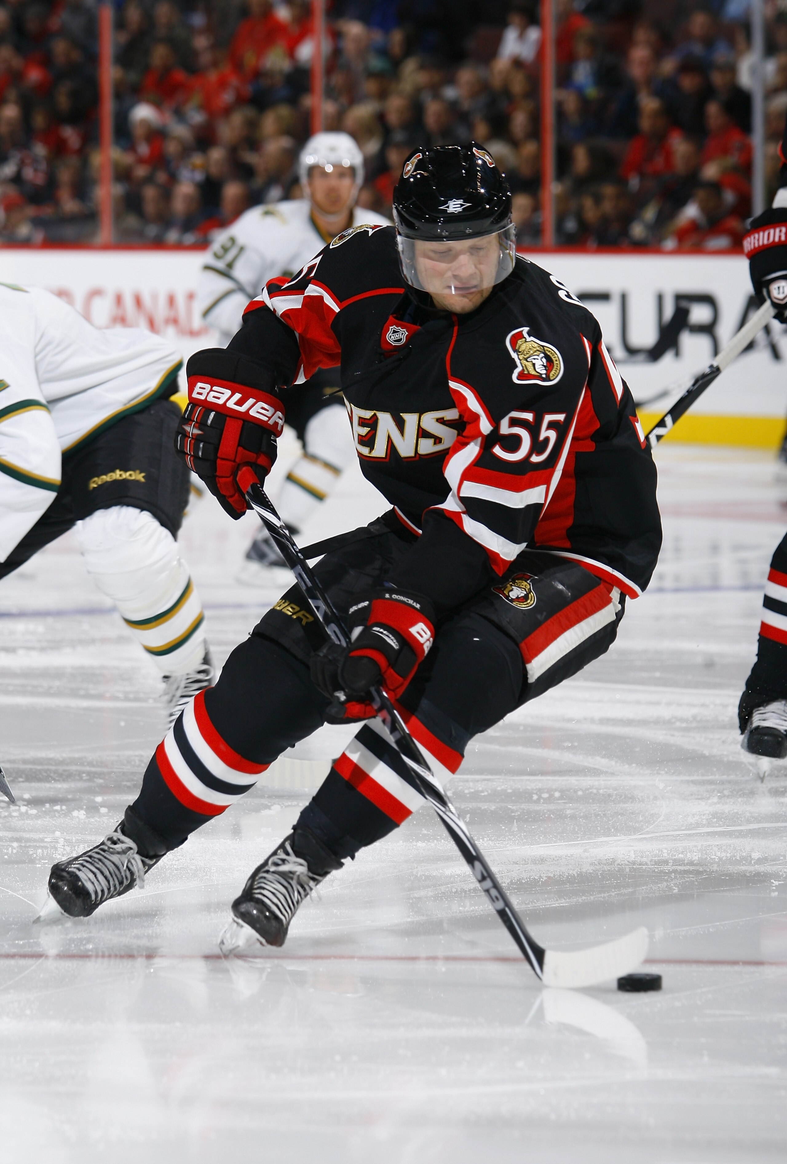 OTTAWA, ON - NOVEMBER 24: Sergei Gonchar #55 of the Ottawa Senators turns back with the puck in a game against the Dallas Stars at Scotiabank Place on November 24, 2010 in Ottawa, Ontario, Canada. (Photo by Phillip MacCallum/Getty Images)