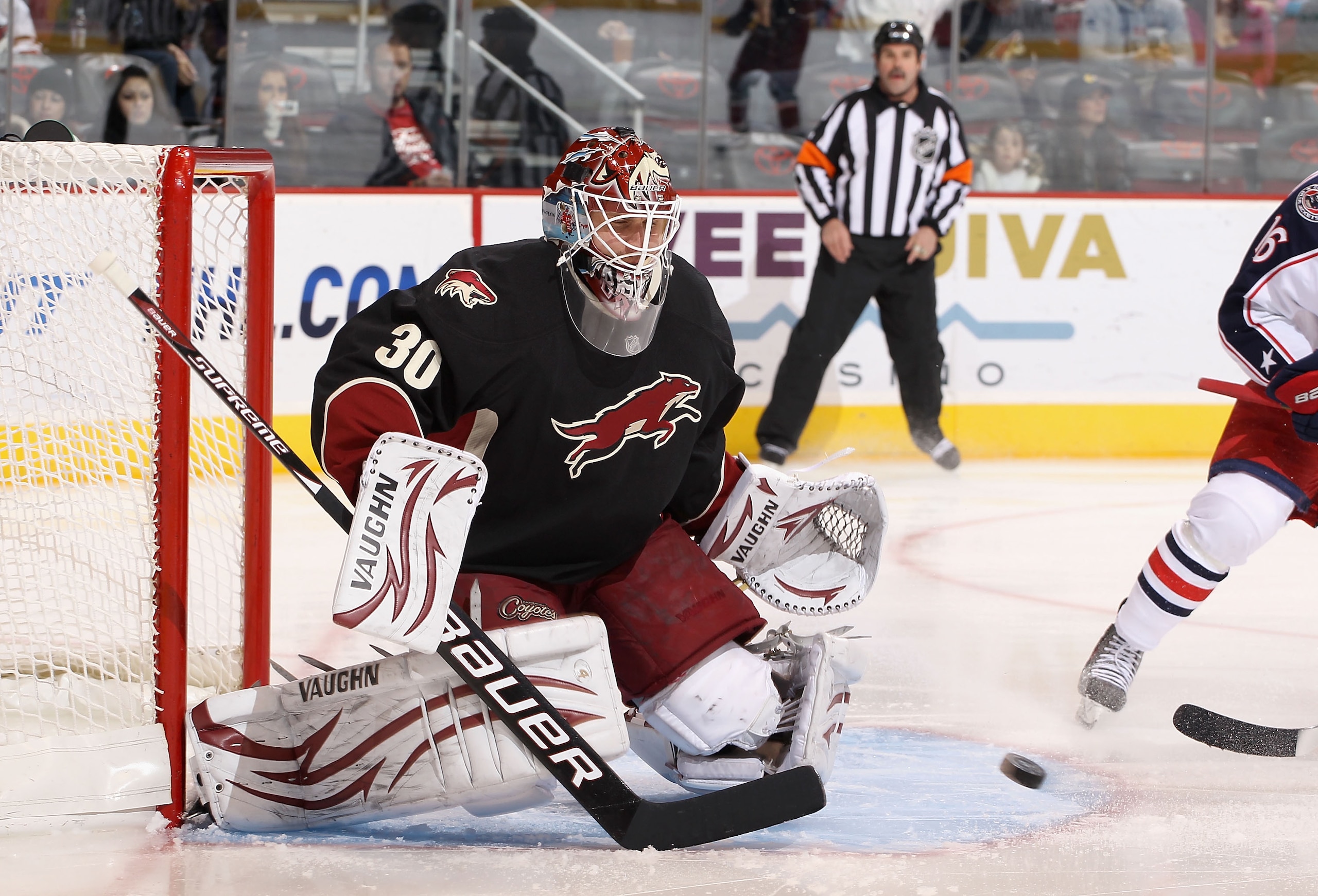 GLENDALE, AZ - JANUARY 04:  Goaltender Ilya Bryzgalov #30 of the Phoenix Coyotes prepares to make a save on a shot from the Columbus Blue Jackets during the first period of the NHL game at Jobing.com Arena on January 4, 2011 in Glendale, Arizona.  (Photo