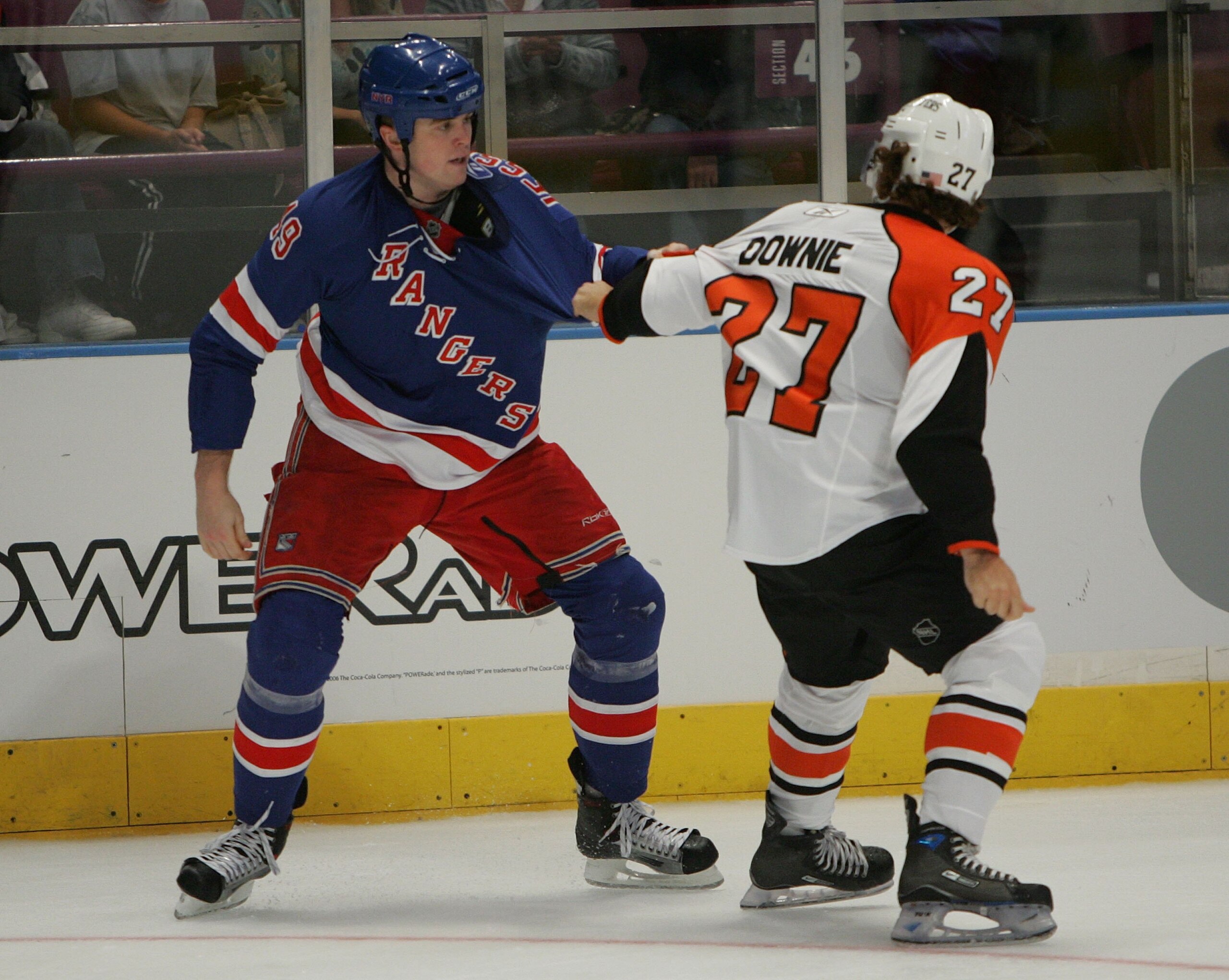 NEW YORK - SEPTEMBER 22: Steve Downie #27 of the Philadelphia Flyers and High Jessiman #49 of the New York Rangers square off during preseason action on September 22, 2007 at Madison Square Garden in New York City.  (Photo by Bruce Bennett/Getty Images)