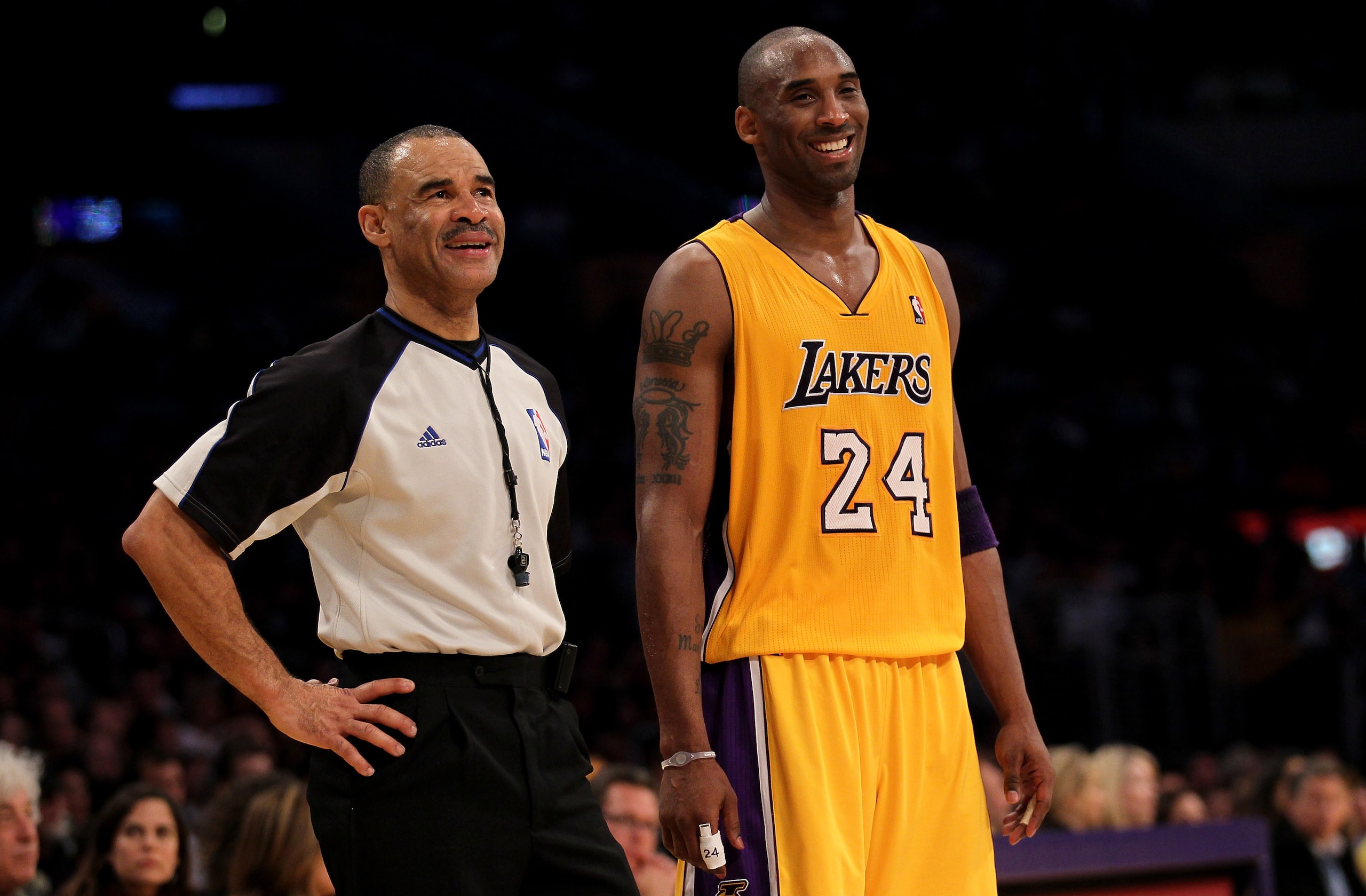 LOS ANGELES, CA - JANUARY 07: Kobe Bryant #24 of the Los Angeles Lakers smiles as he talks with referee Dan Crawford during the game with the New Orleans Hornets at Staples Center on January 7, 2011 in Los Angeles, California. The Lakers won 101-97. NO LOS ANGELES, CA - JANUARY 07: Kobe Bryant #24 of the Los Angeles Lakers smiles as he talks with referee Dan Crawford during the game with the New Orleans Hornets at Staples Center on January 7, 2011 in Los Angeles, California. The Lakers won 101-97. NO
