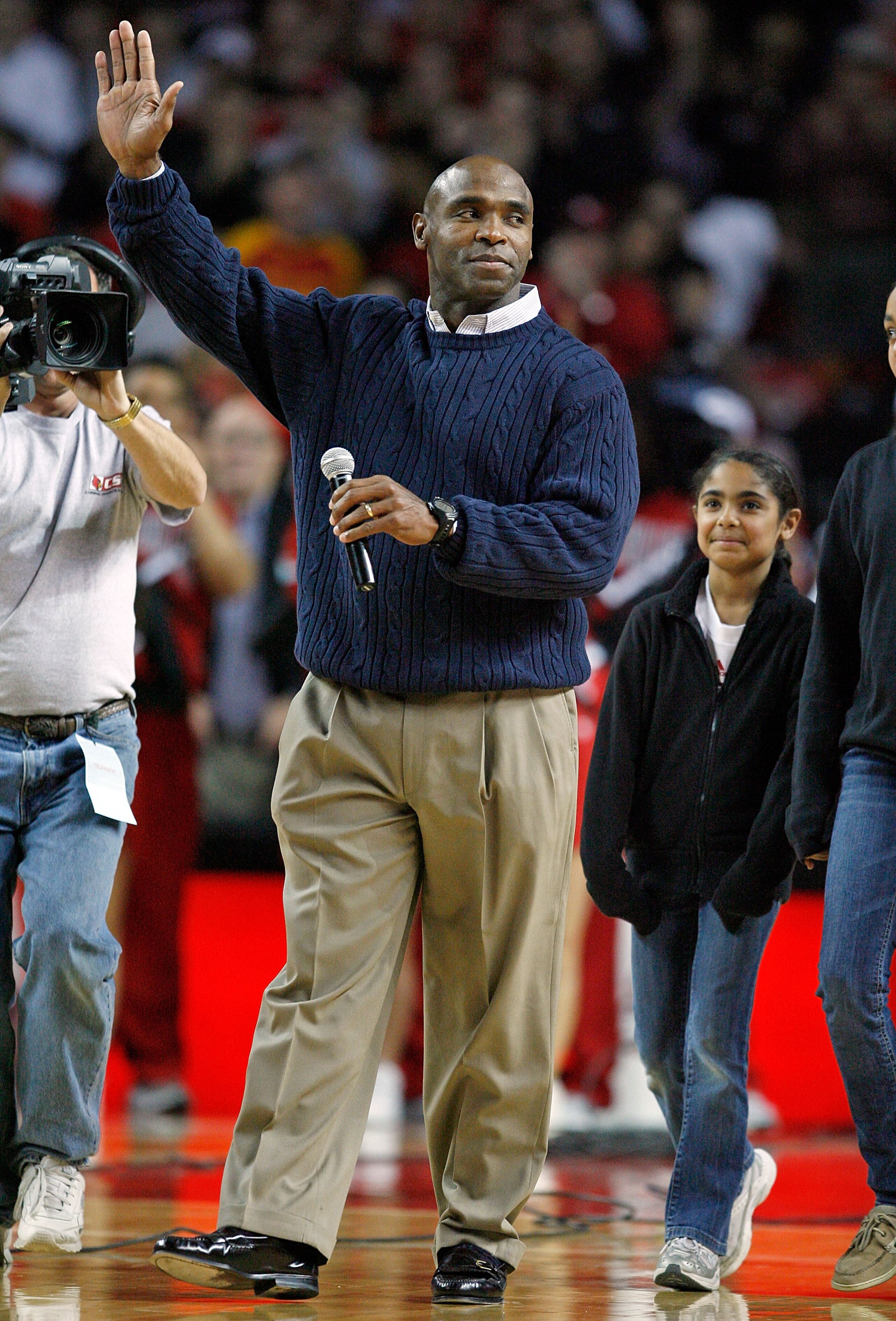 LOUISVILLE, KY - DECEMBER 12:  Charlie Strong the new football Head Coach of the Louisville Cardinals is pictured during the Louisville basketball game against the Western Carolina Catamounts on December 12, 2009 at Freedom Hall in Louisville, Kentucky.