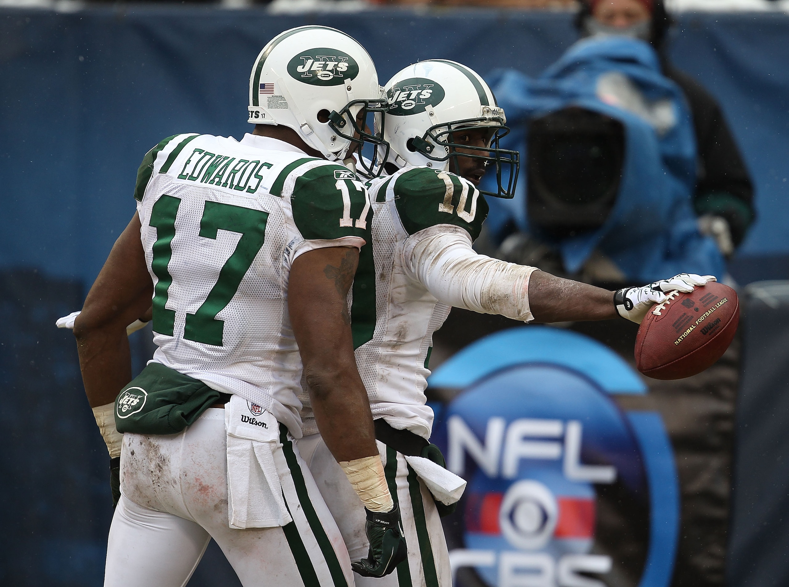 CHICAGO, IL - DECEMBER 26: Santonio Holmes #10 of the New York Jets celebrates a touchdown catch with teammate Braylon Edwards #17 against the Chicago Bears at Soldier Field on December 26, 2010 in Chicago, Illinois. The Bears defeated the Jets 38-34. (Ph