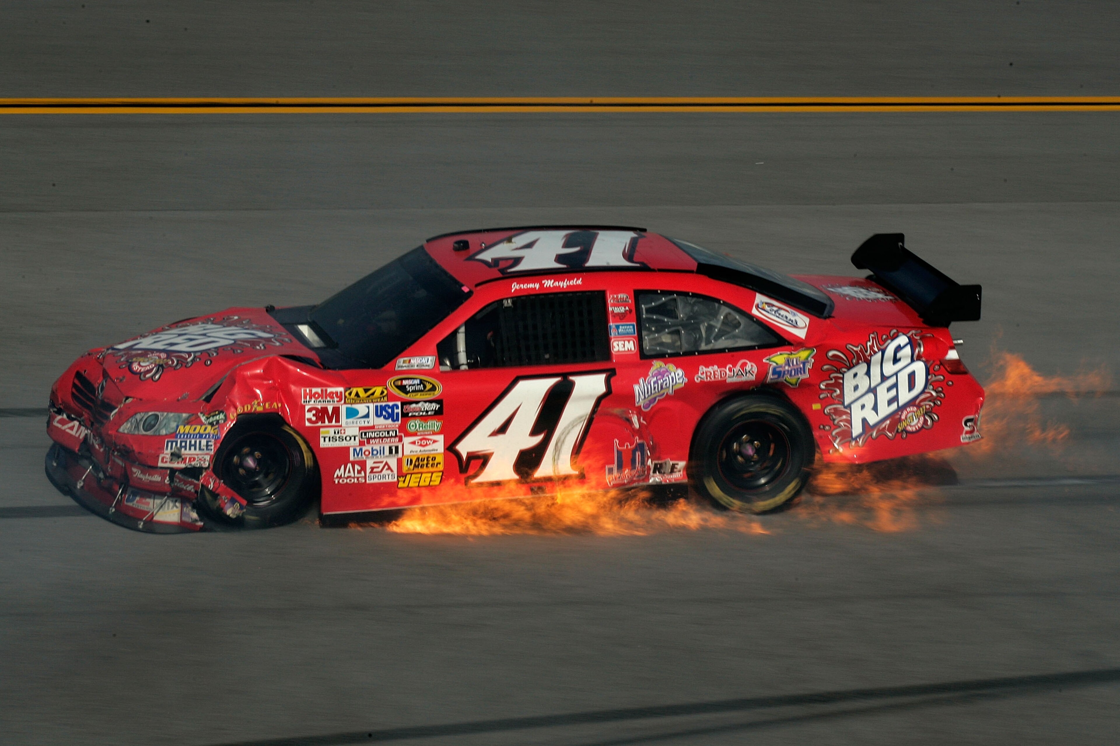 TALLADEGA, AL - APRIL 26: Jeremy Mayfield, driver of the #41 Big Red Toyota, suffers damage during the NASCAR Sprint Cup Series Aaron's 499 at Talladega Superspeedway on April 26, 2009 in Talladega, Alabama. (Photo by Jason Smith/Getty Images for NASCAR TALLADEGA, AL - APRIL 26: Jeremy Mayfield, driver of the #41 Big Red Toyota, suffers damage during the NASCAR Sprint Cup Series Aaron's 499 at Talladega Superspeedway on April 26, 2009 in Talladega, Alabama. (Photo by Jason Smith/Getty Images for NASCAR