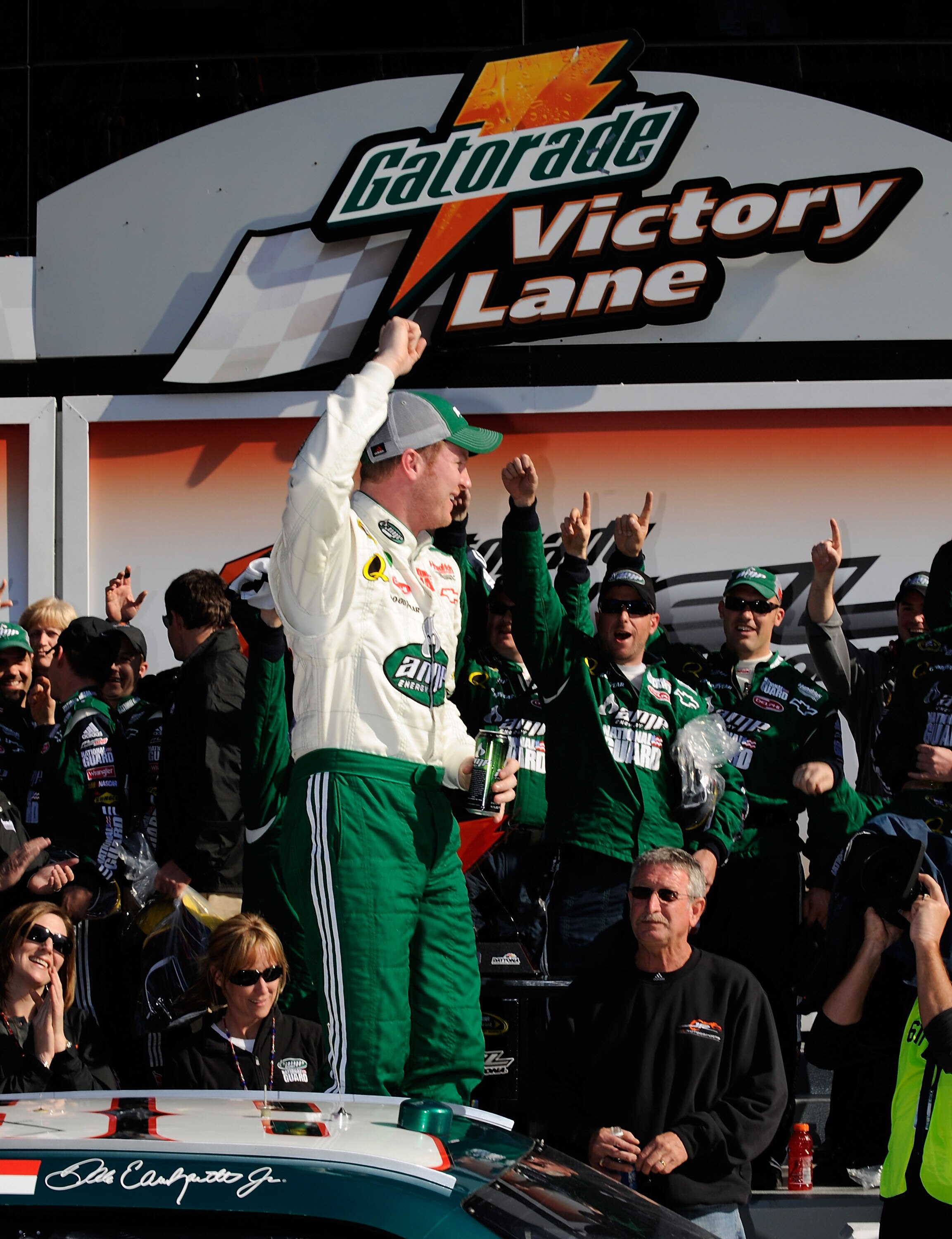 DAYTONA BEACH, FL - FEBRUARY 14:  Dale Earnhardt Jr., driver of the #88 Mountian Dew AMP/National Guard Chevrolet, celebrates after winning the first of two NASCAR Sprint Cup Gatorade Duels 150 at Daytona International Speedway on February 14, 2008 in Day