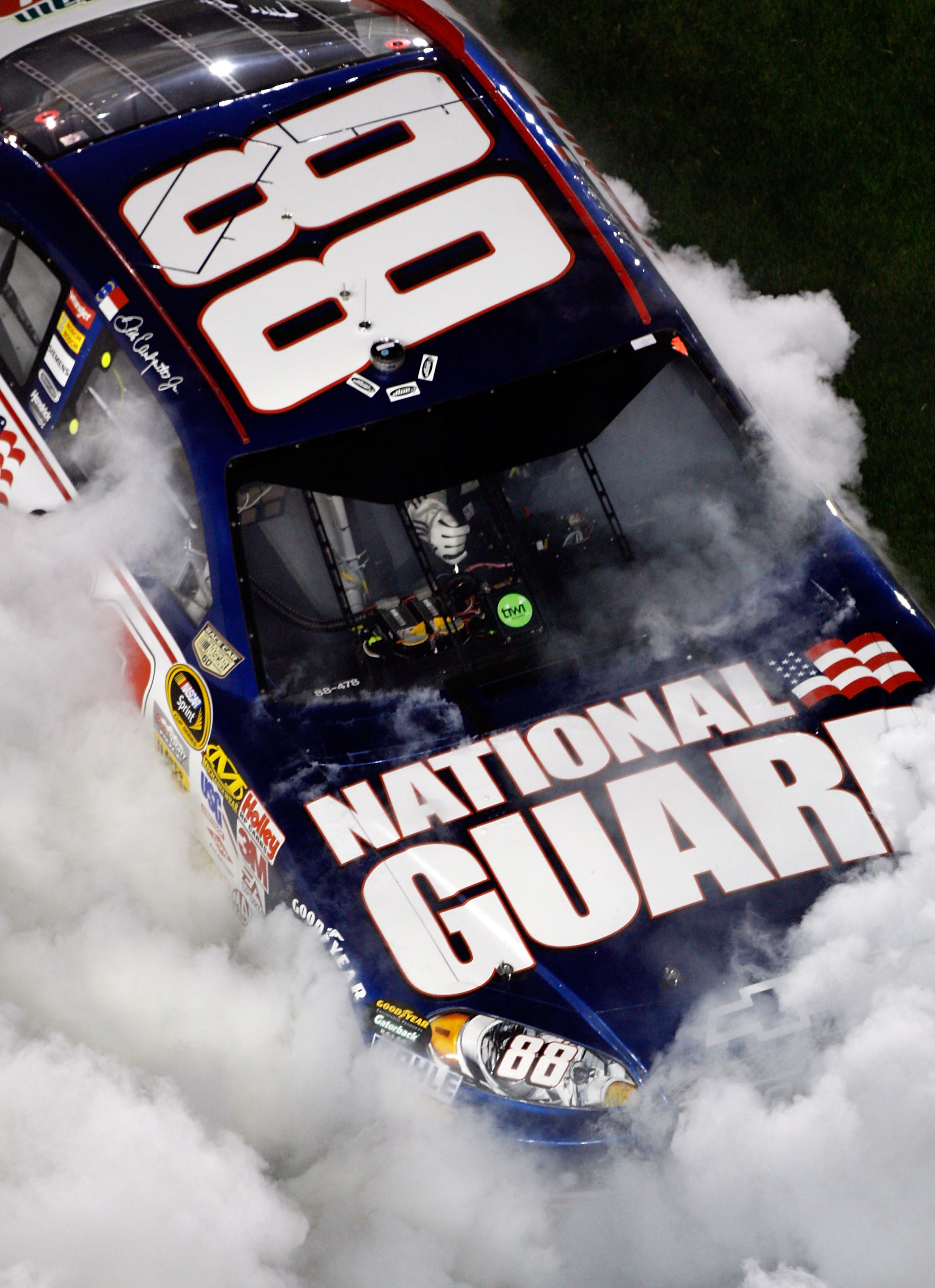 DAYTONA BEACH, FL - FEBRUARY 09: Dale Earnhardt Jr., driver of the #88 Mountian Dew AMP/National Guard Chevrolet, does a burnout after winning the Budweiser Shootout at Daytona International Speedway on February 9, 2008 in Daytona, Florida. (Photo by Ch DAYTONA BEACH, FL - FEBRUARY 09: Dale Earnhardt Jr., driver of the #88 Mountian Dew AMP/National Guard Chevrolet, does a burnout after winning the Budweiser Shootout at Daytona International Speedway on February 9, 2008 in Daytona, Florida. (Photo by Ch
