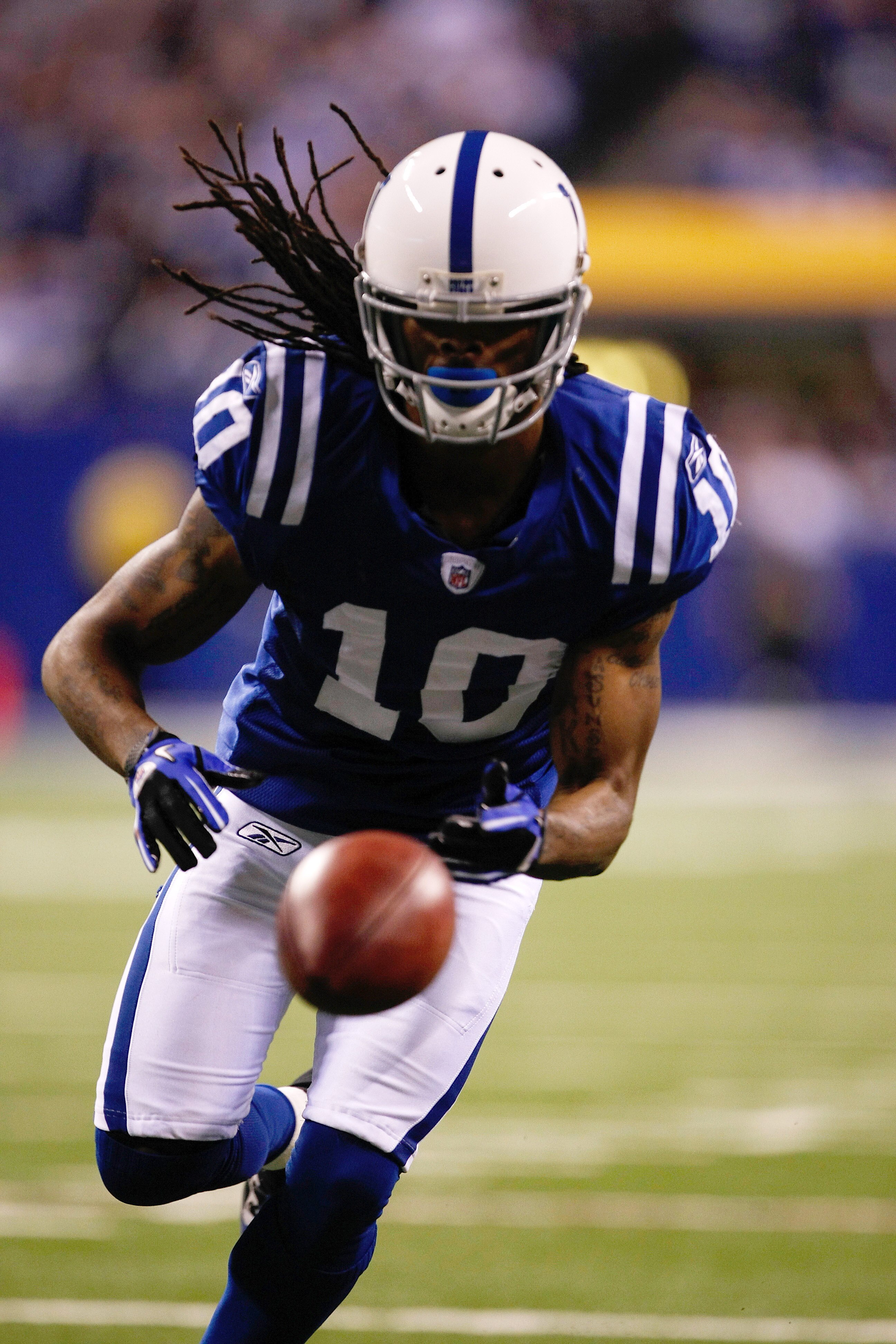 INDIANAPOLIS, IN - DECEMBER 05: Taj Smith #10 of the Indianapolis Colts recovers the football for a touchdown after blocking a punt against the Dallas Cowboys at Lucas Oil Stadium on December 5, 2010 in Indianapolis, Indiana. The Cowboys defeated the Colt