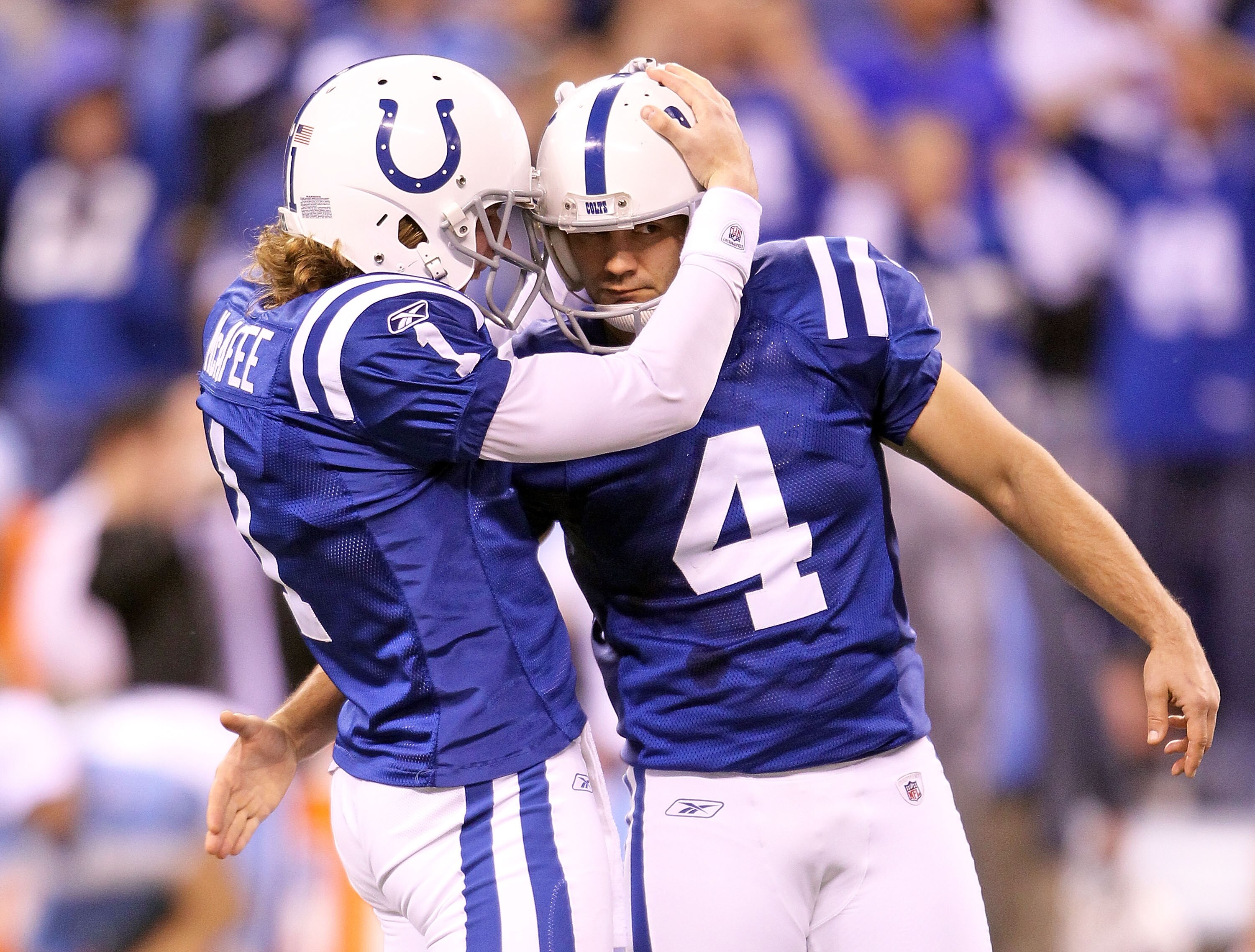 INDIANAPOLIS - JANUARY 02:  Pat McAfee #1 and Adam Vinatieri #4 of the Indianapolis Colts celebrate after Vinatieri made a 43 yard field goal as time expired to beat the Tennessee Titans 23-20 at Lucas Oil Stadium on January 2, 2011 in Indianapolis, India