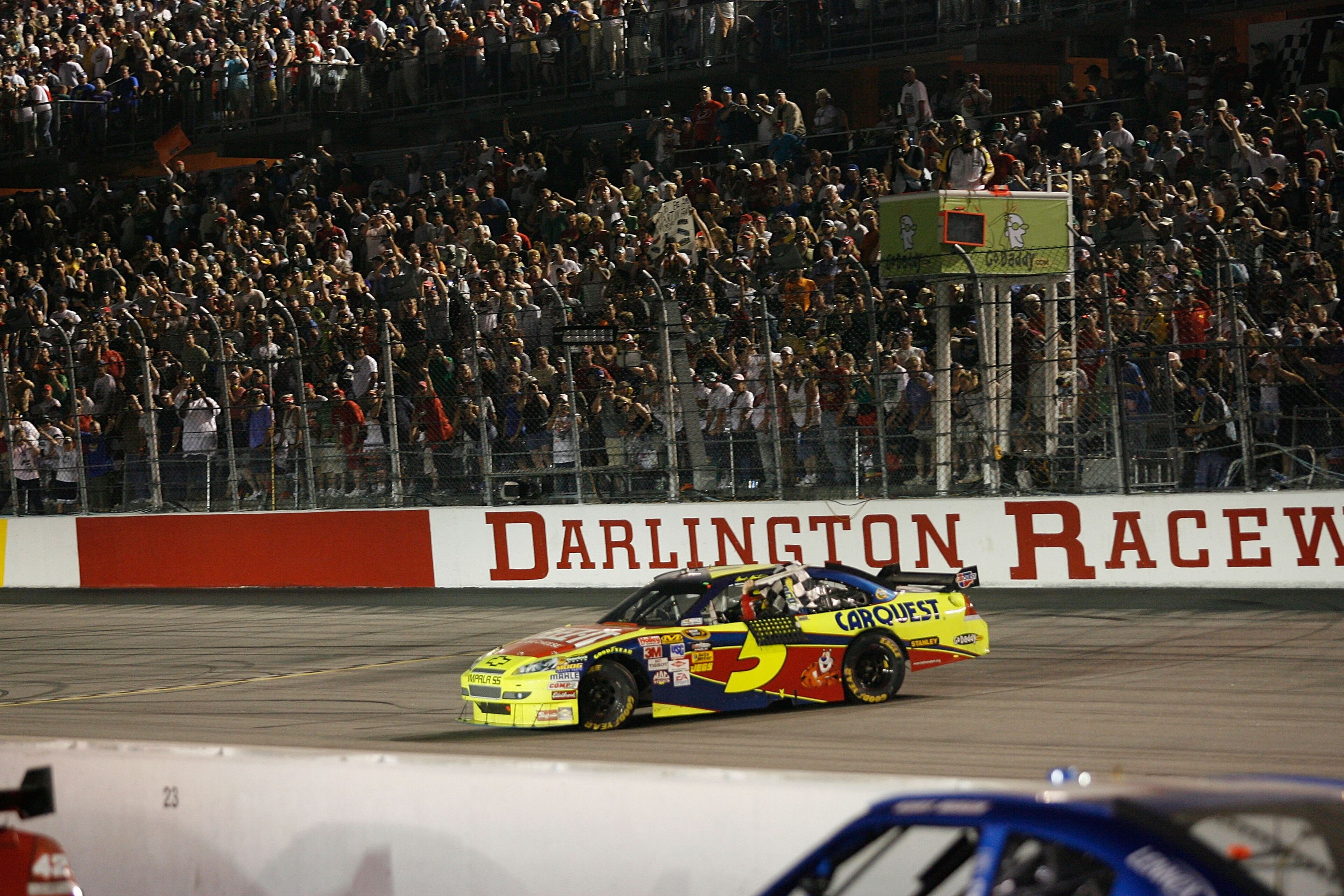 DARLINGTON, SC - MAY 09: Mark Martin, driver of the #5 Cheez-It/CARQUEST Chevrolet, celebrates winning the NASCAR Sprint Cup Series Southern 500 on May 9, 2009 at Darlington Raceway in Darlington, South Carolina. (Photo by Geoff Burke/Getty Images for NA DARLINGTON, SC - MAY 09: Mark Martin, driver of the #5 Cheez-It/CARQUEST Chevrolet, celebrates winning the NASCAR Sprint Cup Series Southern 500 on May 9, 2009 at Darlington Raceway in Darlington, South Carolina. (Photo by Geoff Burke/Getty Images for NA
