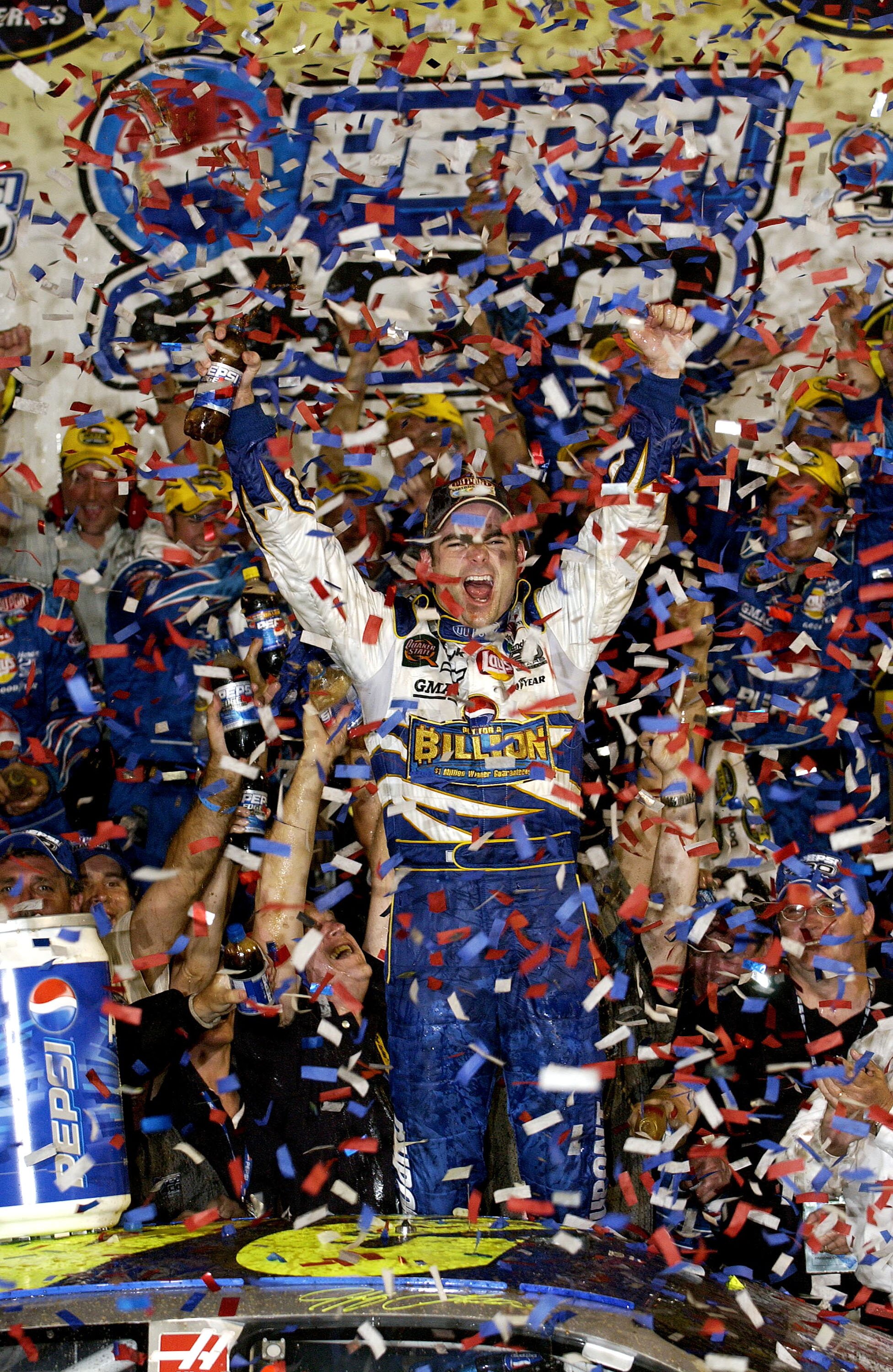 DAYTONA, FL- July 3:  Jeff Gordon, driver of the #24 Dupont Chevrolet, celebrates winning the Pepsi 400 on July 3, 2004 at Daytona International Speedway in Daytona, Florida.  (Photo By Rusty Jarrett/Getty Images)