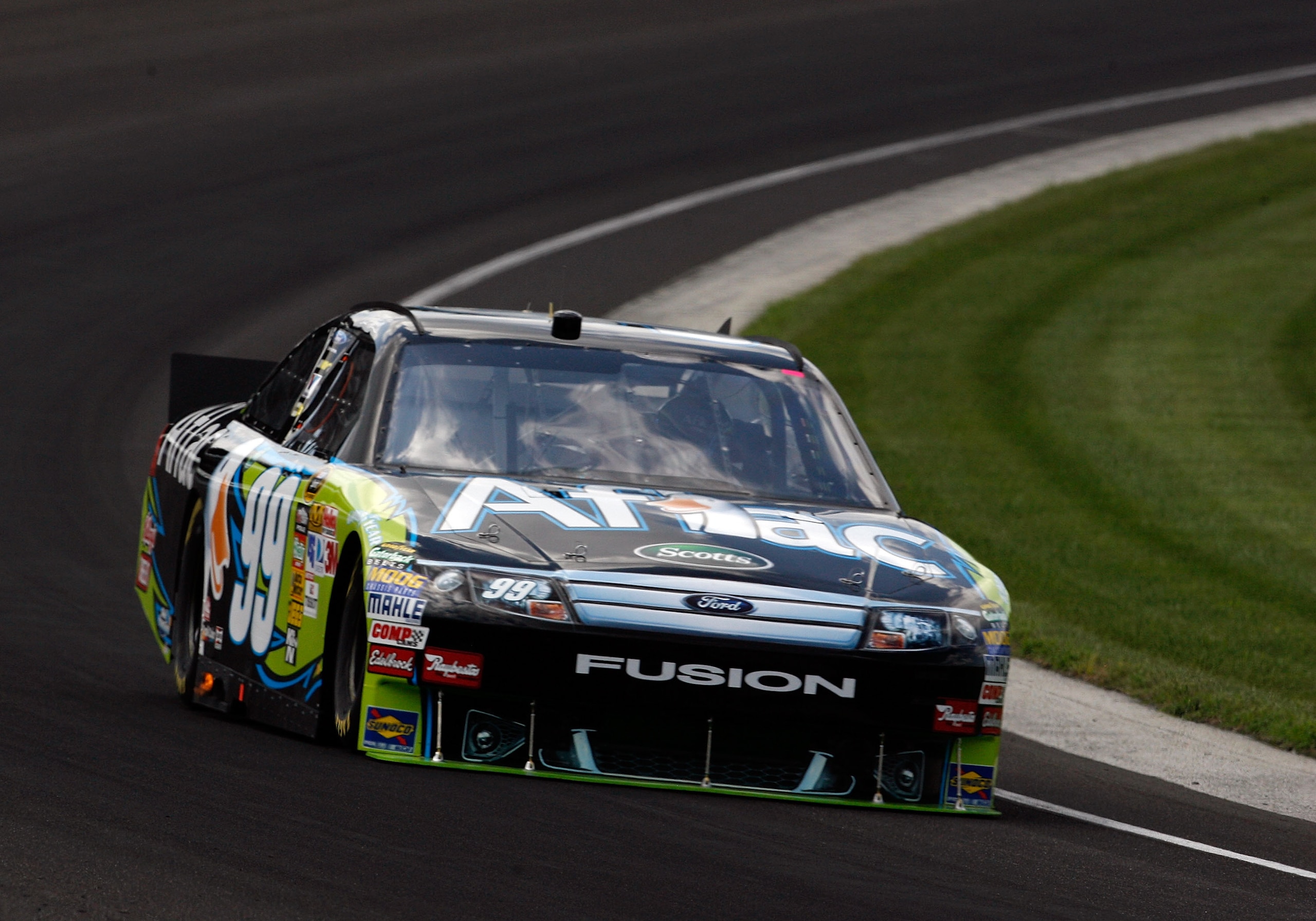 INDIANAPOLIS - JULY 23:  Carl Edwards, driver of the #99 AflacFord, drives during practice for the NASCAR Sprint Cup Series Brickyard 400 at Indianapolis Motor Speedway on July 23, 2010 in Indianapolis, Indiana.  (Photo by Tom Pennington/Getty Images for 