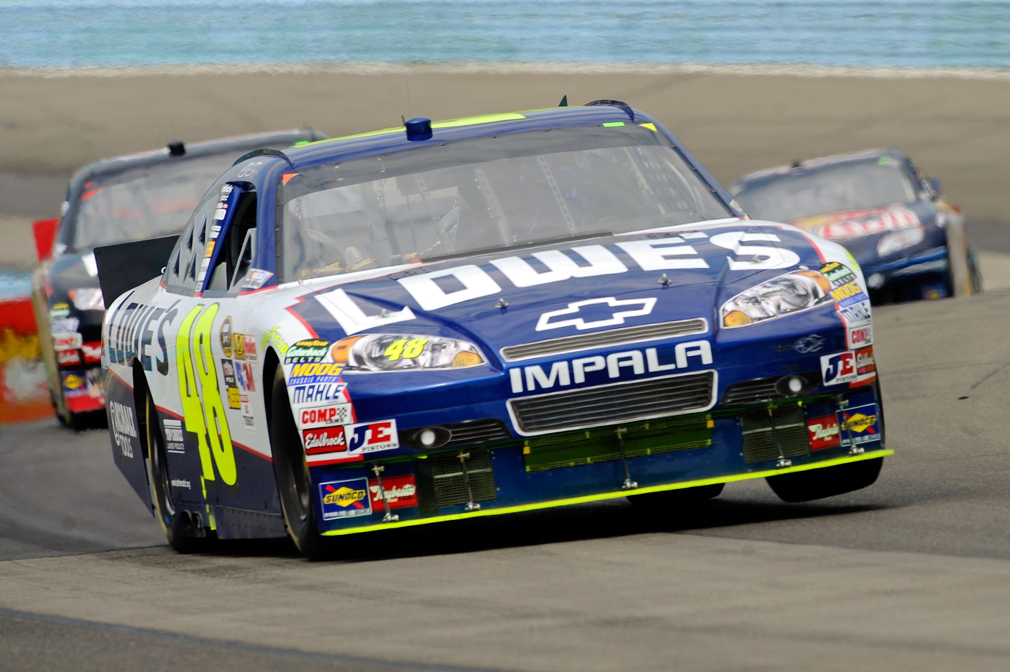 WATKINS GLEN, NY - AUGUST 08:  Jimmie Johnson, drives the #48 Lowe's Chevrolet, during the NASCAR Sprint Cup Series Heluva Good! Sour Cream Dips at Watkins Glen International on August 8, 2010 in Watkins Glen, New York.  (Photo by Jeff Zelevansky/Getty Im