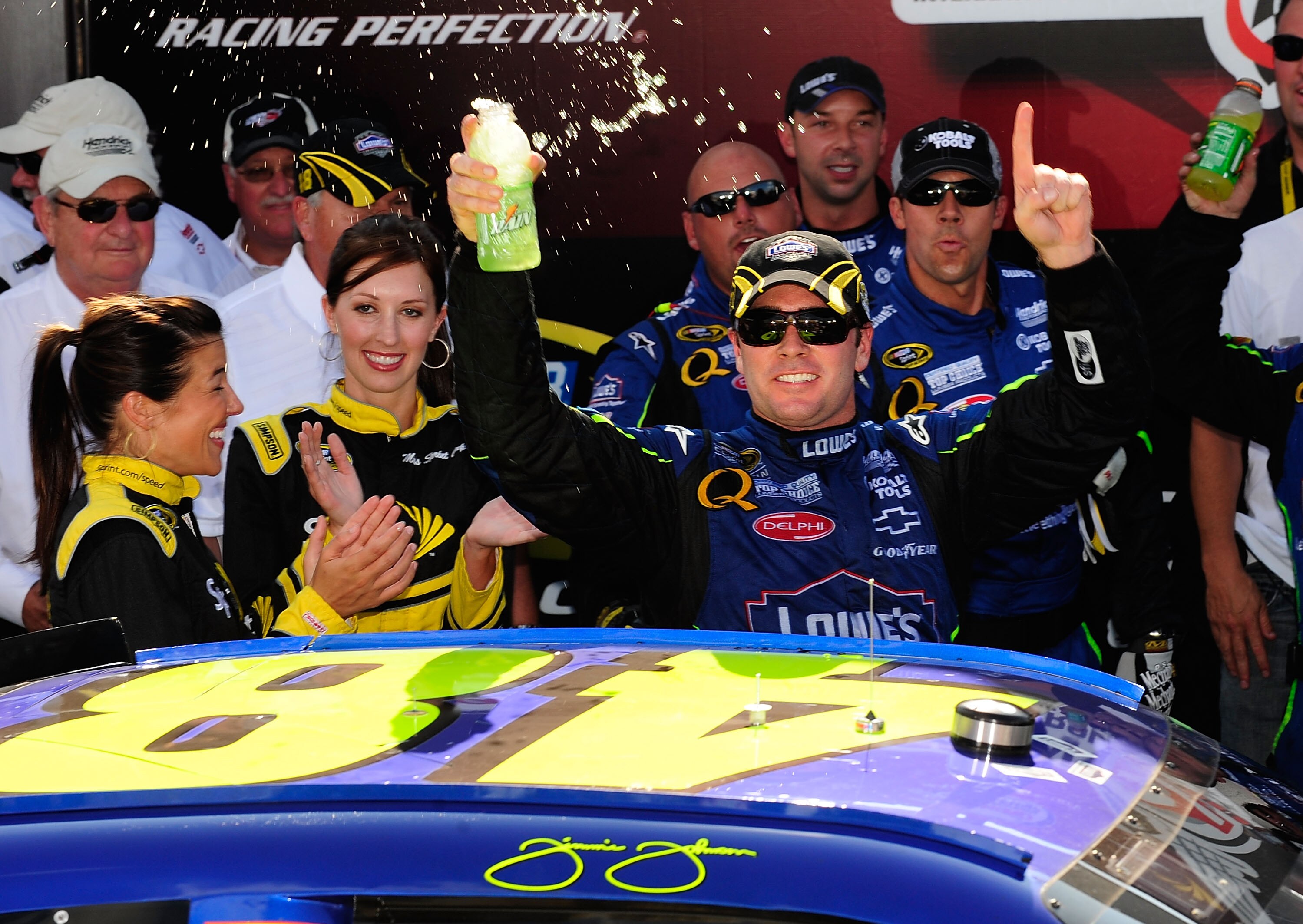 RICHMOND, VA - SEPTEMBER 07:  Jimmie Johnson, driver of the #48 Lowes Chevrolet celebrates winning the NASCAR Sprint Cup Series Chevy Rock & Roll 400 at Richmond International Raceway on September 7, 2008 in Richmond, Virginia.  (Photo by Rusty Jarrett/Ge