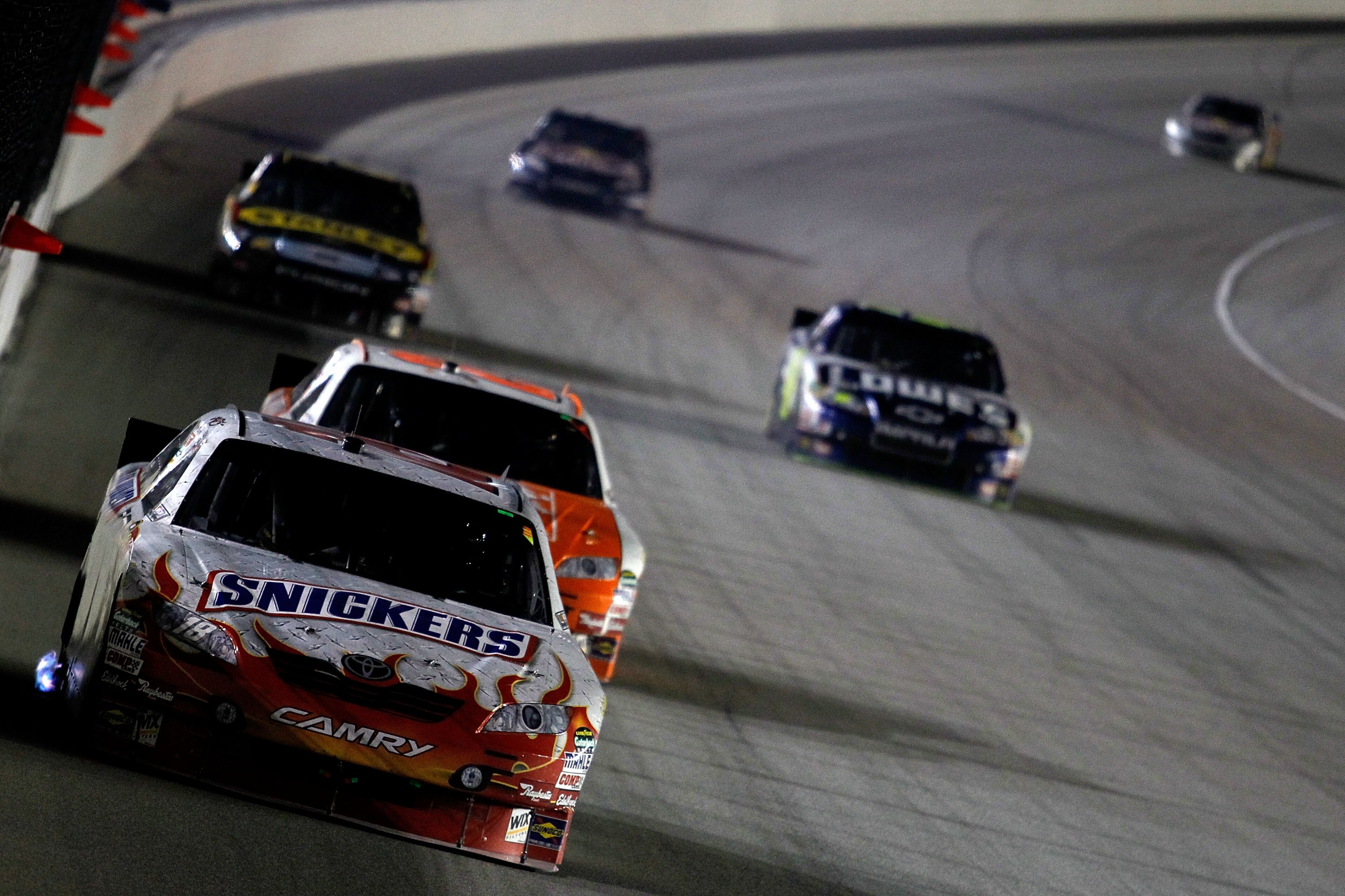 JOLIET, IL - JULY 10: Kyle Busch, driver of the #18 Snickers Toyota, drives during the NASCAR Sprint Cup Series LIFELOCK.COM 400 at the Chicagoland Speedway on July 10, 2010 in Joliet, Illinois. (Photo by Todd Warshaw/Getty Images for NASCAR) JOLIET, IL - JULY 10: Kyle Busch, driver of the #18 Snickers Toyota, drives during the NASCAR Sprint Cup Series LIFELOCK.COM 400 at the Chicagoland Speedway on July 10, 2010 in Joliet, Illinois. (Photo by Todd Warshaw/Getty Images for NASCAR)