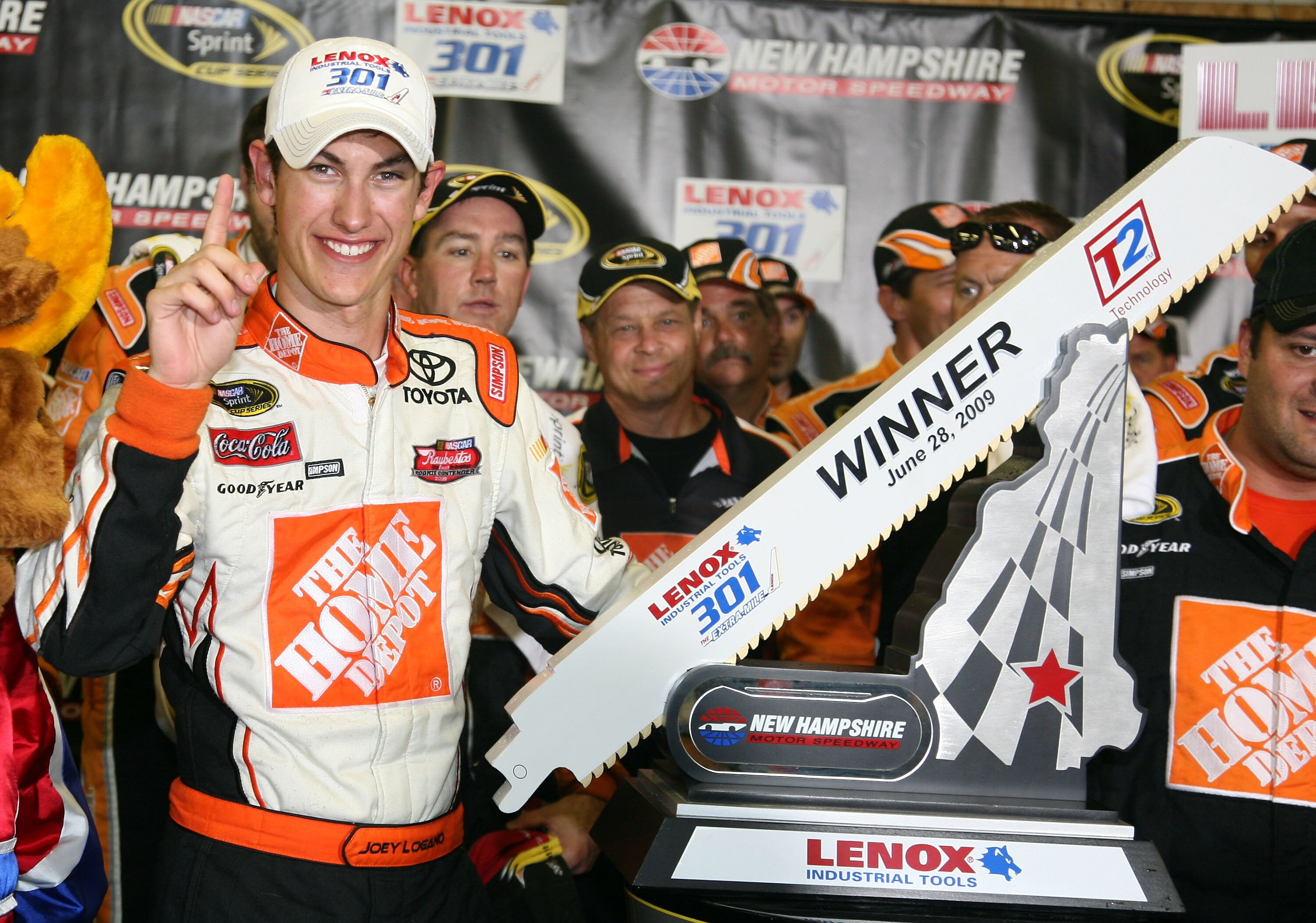 LOUDON, NH - JUNE 28:  Joey Logano, driver of the #20 Home Depot Toyota, celebrates winning the NASCAR Sprint Cup Series LENOX Industrial Tools 301 at New Hampshire Motor Speedway on June 28, 2009 in Loudon, New Hampshire. Logano won the rain shortened ra