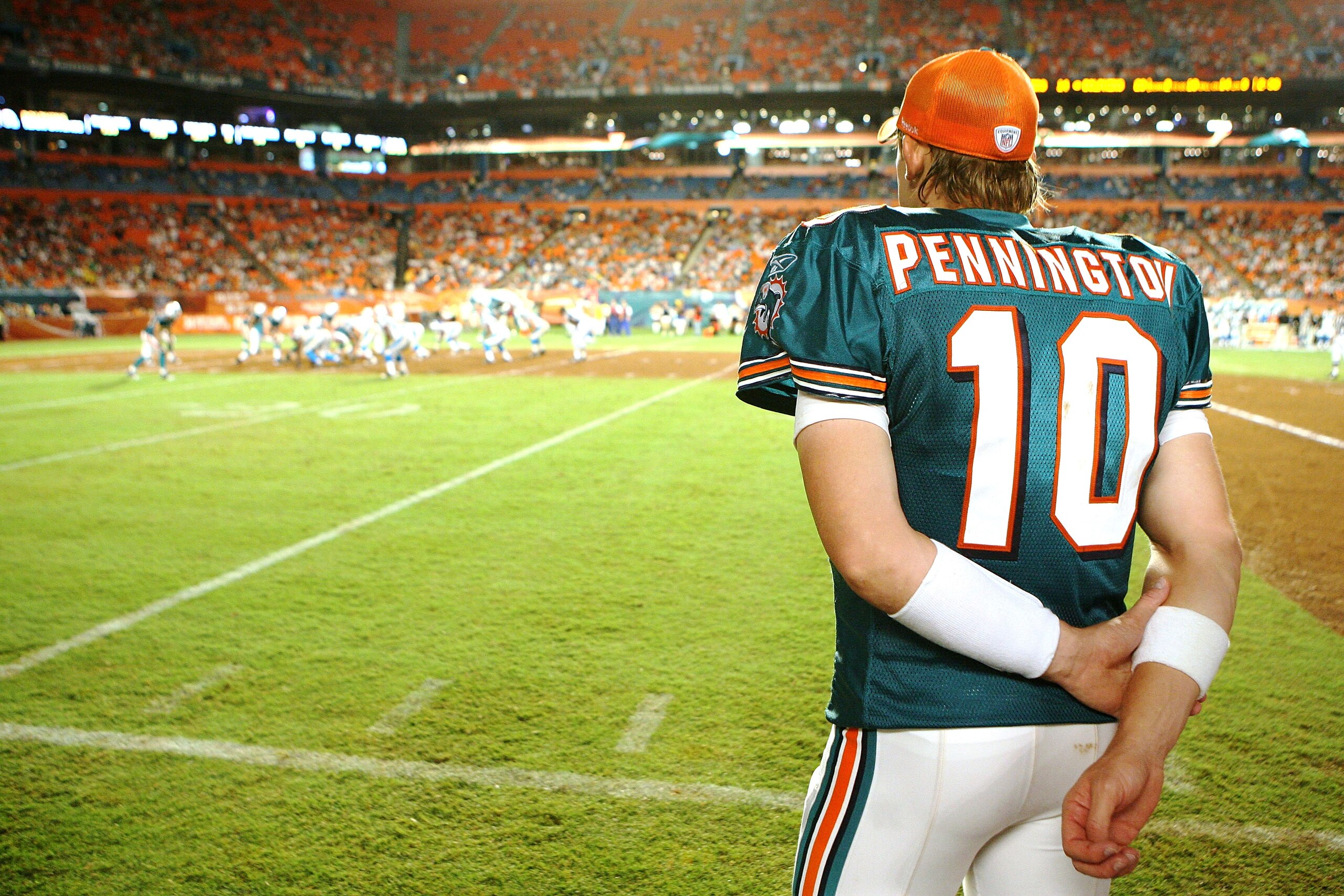 MIAMI - AUGUST 22:  Quarterback Chad Pennington #10 of the Miami Dolphins watches from the sidelines as his team takes on the Carolina Panthers during a pre-season game at Land Shark Stadium on August 22, 2009 in Miami, Florida. The Dolphins defeated the