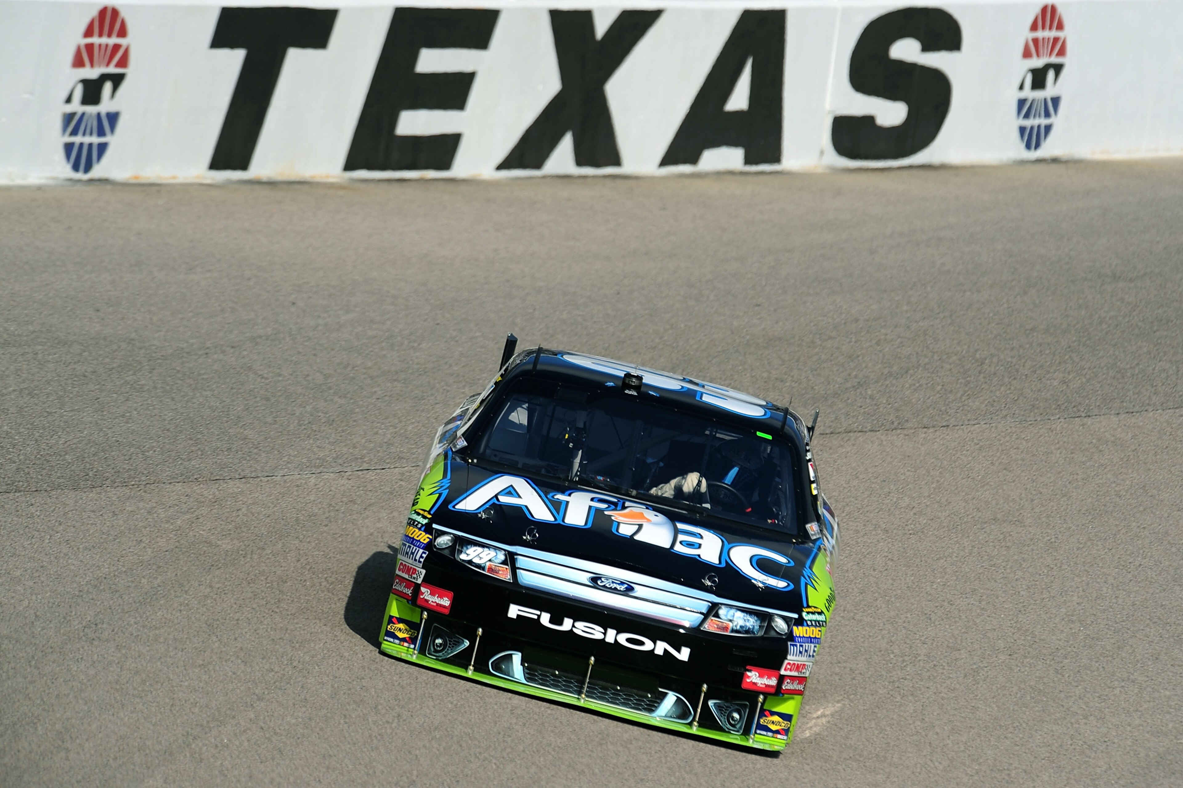 FORT WORTH, TX - NOVEMBER 07: Carl Edwards drives the #99 Aflac Ford during practice for the NASCAR Sprint Cup Series Dickies 500 at Texas Motor Speedway on November 7, 2009 in Fort Worth, Texas. (Photo by Robert Laberge/Getty Images for NASCAR) FORT WORTH, TX - NOVEMBER 07: Carl Edwards drives the #99 Aflac Ford during practice for the NASCAR Sprint Cup Series Dickies 500 at Texas Motor Speedway on November 7, 2009 in Fort Worth, Texas. (Photo by Robert Laberge/Getty Images for NASCAR)