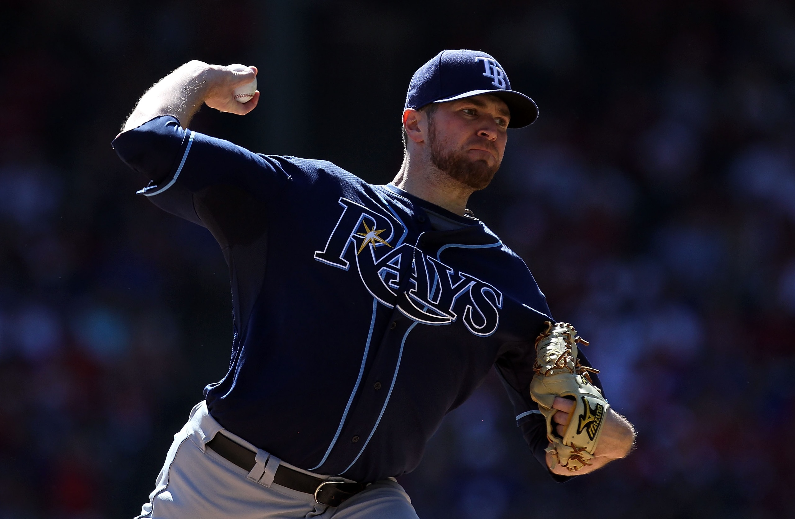 ARLINGTON, TX - OCTOBER 10: Pitcher Wade Davis #40 of the Tampa Bay Rays throws against the Texas Rangers in the first inning during game 4 of the ALDS at Rangers Ballpark in Arlington on October 10, 2010 in Arlington, Texas. (Photo by Ronald Martinez/G ARLINGTON, TX - OCTOBER 10: Pitcher Wade Davis #40 of the Tampa Bay Rays throws against the Texas Rangers in the first inning during game 4 of the ALDS at Rangers Ballpark in Arlington on October 10, 2010 in Arlington, Texas. (Photo by Ronald Martinez/G