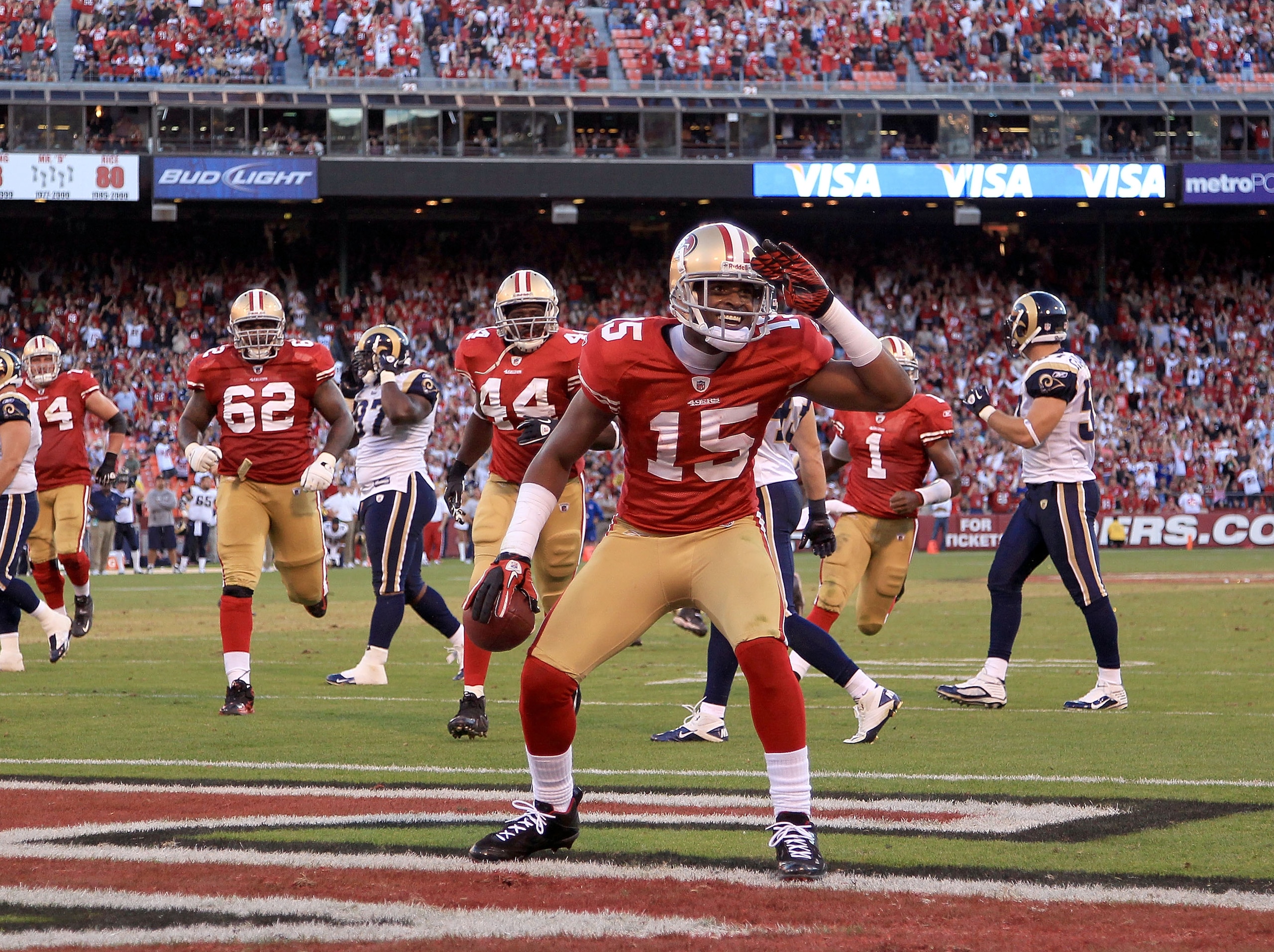 SAN FRANCISCO - NOVEMBER 14: Michael Crabtree #15 of the San Francisco 49ers celebrates after scoring a touchdown against the St. Louis Rams at Candlestick Park on November 14, 2010 in San Francisco, California. (Photo by Ezra Shaw/Getty Images) SAN FRANCISCO - NOVEMBER 14: Michael Crabtree #15 of the San Francisco 49ers celebrates after scoring a touchdown against the St. Louis Rams at Candlestick Park on November 14, 2010 in San Francisco, California. (Photo by Ezra Shaw/Getty Images)