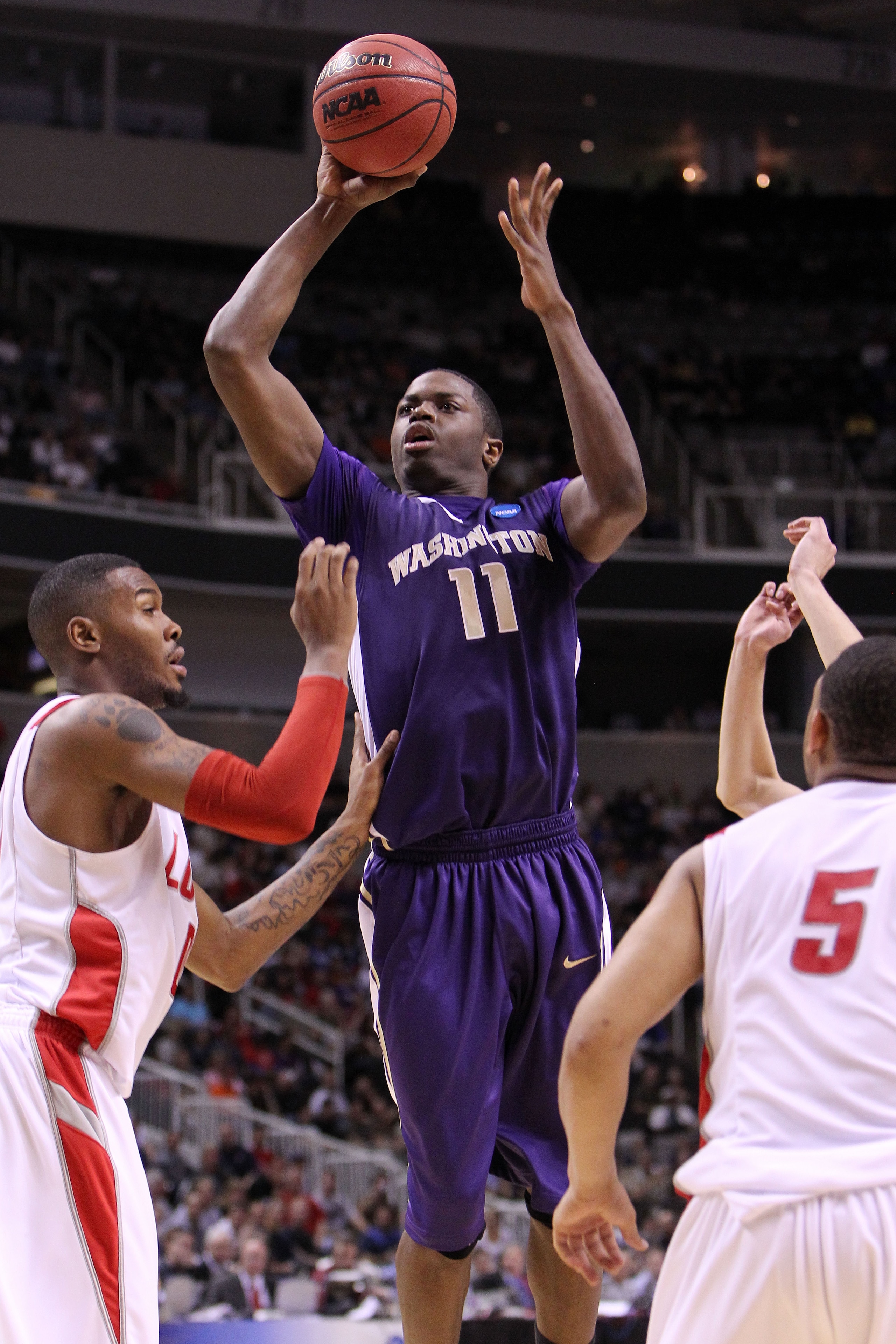 SAN JOSE, CA - MARCH 20:  Forward Matthew Bryan-Amaning #11 of the Washington Huskies takes a shot against the New Mexico Lobos during the second round of the 2010 NCAA men's basketball tournament at HP Pavilion on March 20, 2010 in San Jose, California.