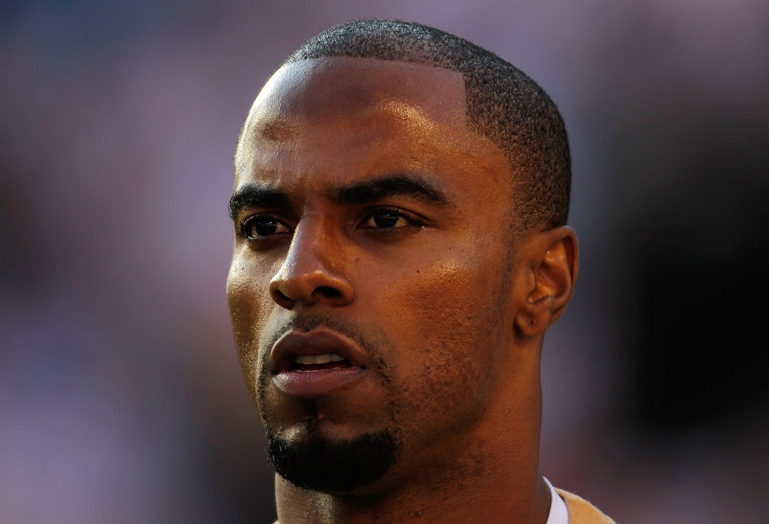 MIAMI GARDENS, FL - FEBRUARY 07: Safety Darren Sharper #42 of the New Orleans Saints warms up on the field prior to Super Bowl XLIV against the Indianapolis Colts on February 7, 2010 at Sun Life Stadium in Miami Gardens, Florida.  (Photo by Donald Miralle