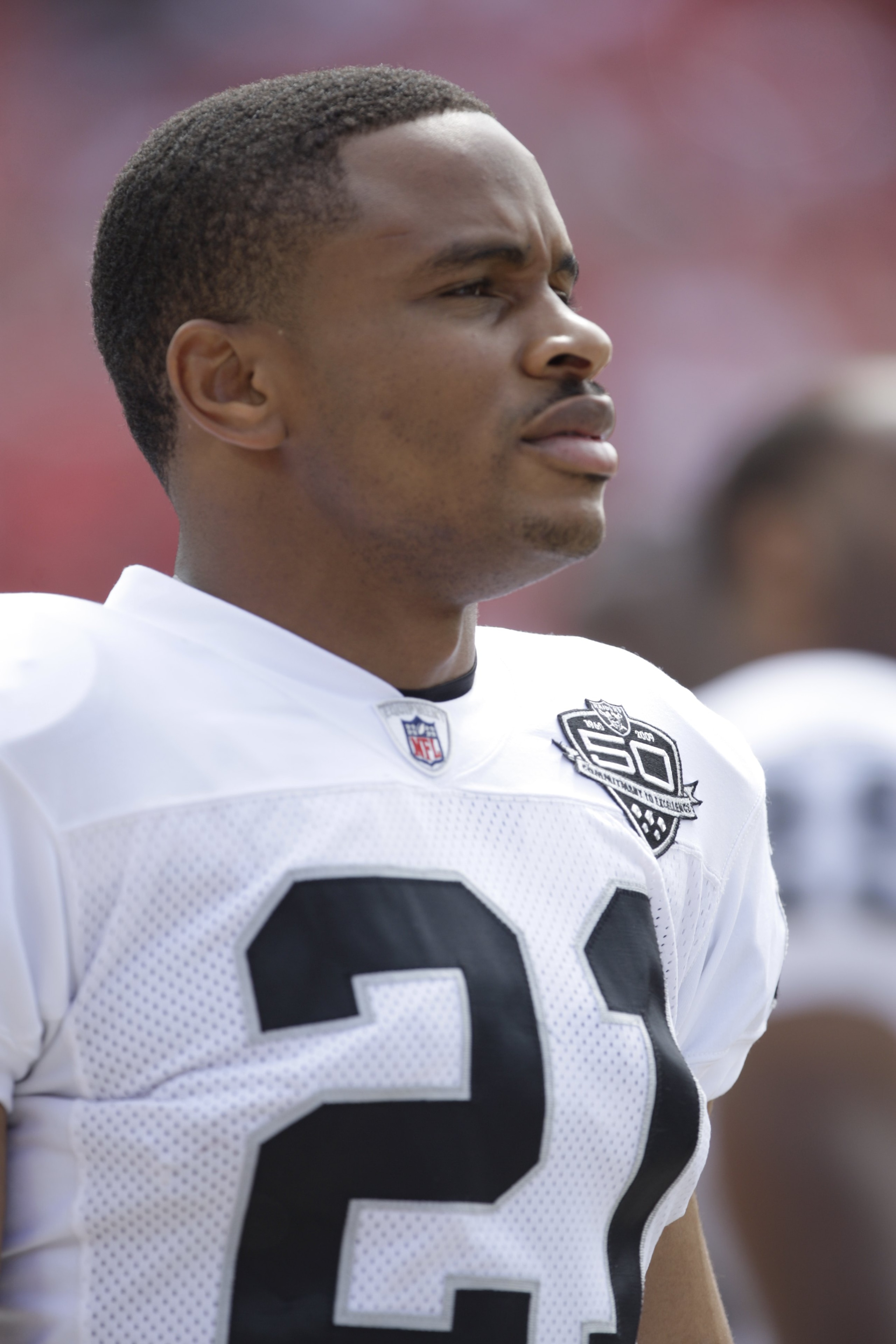 KANSAS CITY, MO - SEPTEMBER 20:  Nnamdi Asomugha #21 of the Oakland Raiders looks on during the game against the Kansas City Chiefs at Arrowhead Stadium on September 20, 2009 in Kansas City, Missouri. (Photo by Jamie Squire/Getty Images)