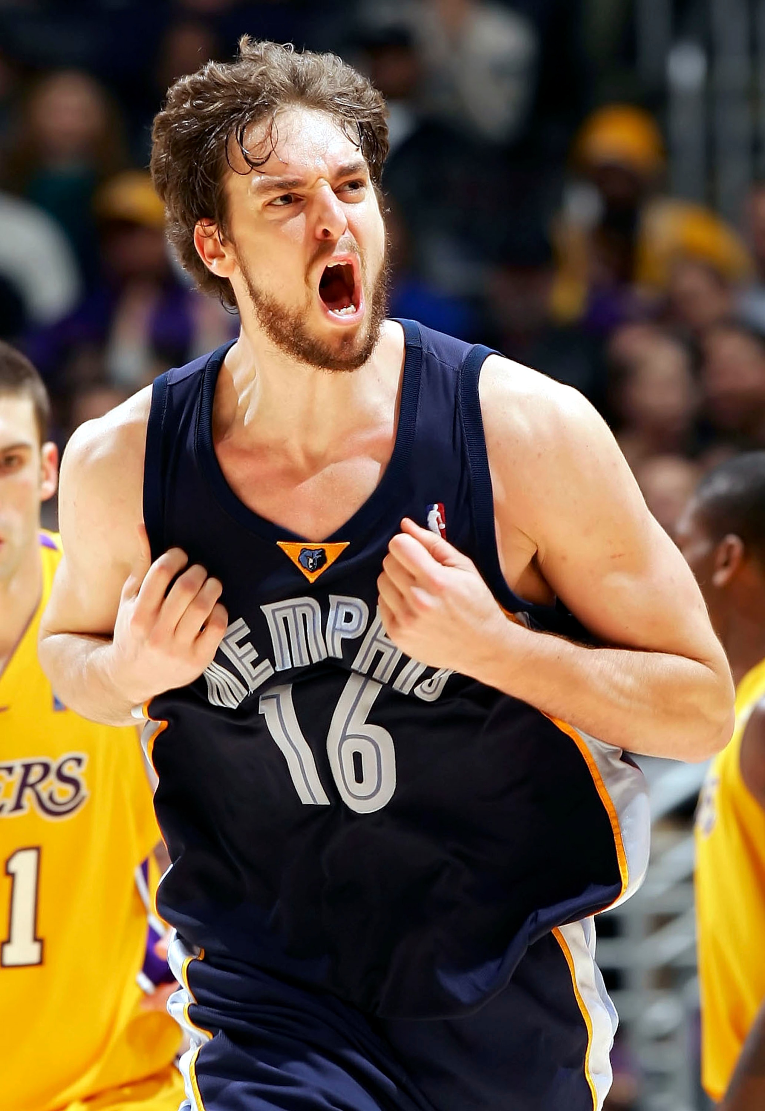 LOS ANGELES - DECEMBER 28:   Pau Gasol #16 of the Memphis Grizzlies celebrates during the game against the Los Angeles Lakers on December 28, 2005 at Staples Center in Los Angeles, California. NOTE TO USER: User expressly acknowledges and agrees that, by