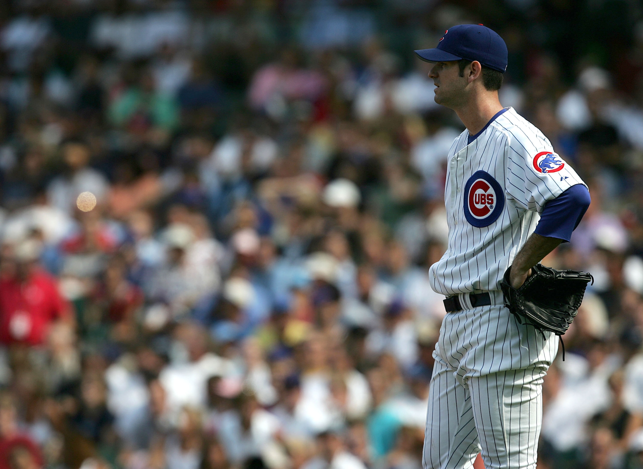 CHICAGO - AUGUST 24:  Starting pitcher Mark Prior #22 of the Chicago Cubs reacts after giving up three runs in the seventh inning against the Atlanta Braves on August 24, 2005 at Wrigley Field in Chicago, Illinois. The Braves defeated the Cubs 3-1.  (Phot