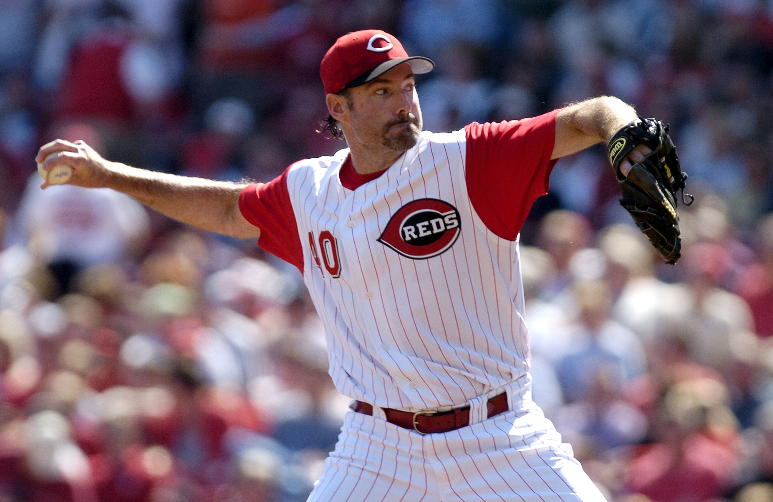 CINCINNATI, OH - APRIL 4:  Paul Wilson #40 of the Cincinnati Reds winds up for a pitch on April 4, 2005 at Great American Ballpark in Cincinnati, Ohio. The Reds defeated the Mets 7-6.  (Photo by David Maxwell/Getty Images)
