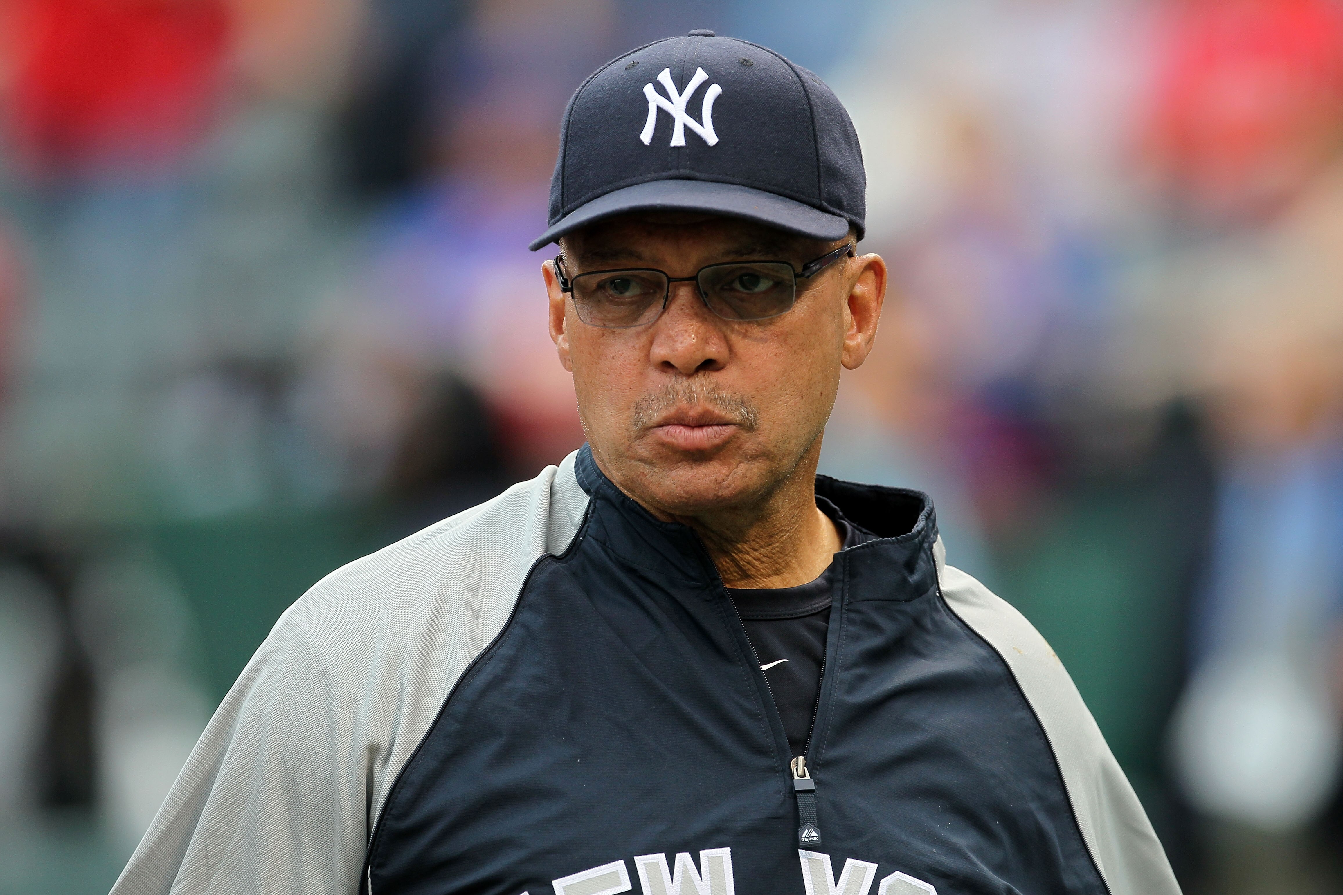 ARLINGTON, TX - OCTOBER 22:  Baseball Hall of Famer Reggie Jackson looks on during batting prior to the New York Yankees playing against the Texas Rangers in Game Six of the ALCS during the 2010 MLB Playoffs at Rangers Ballpark in Arlington on October 22,