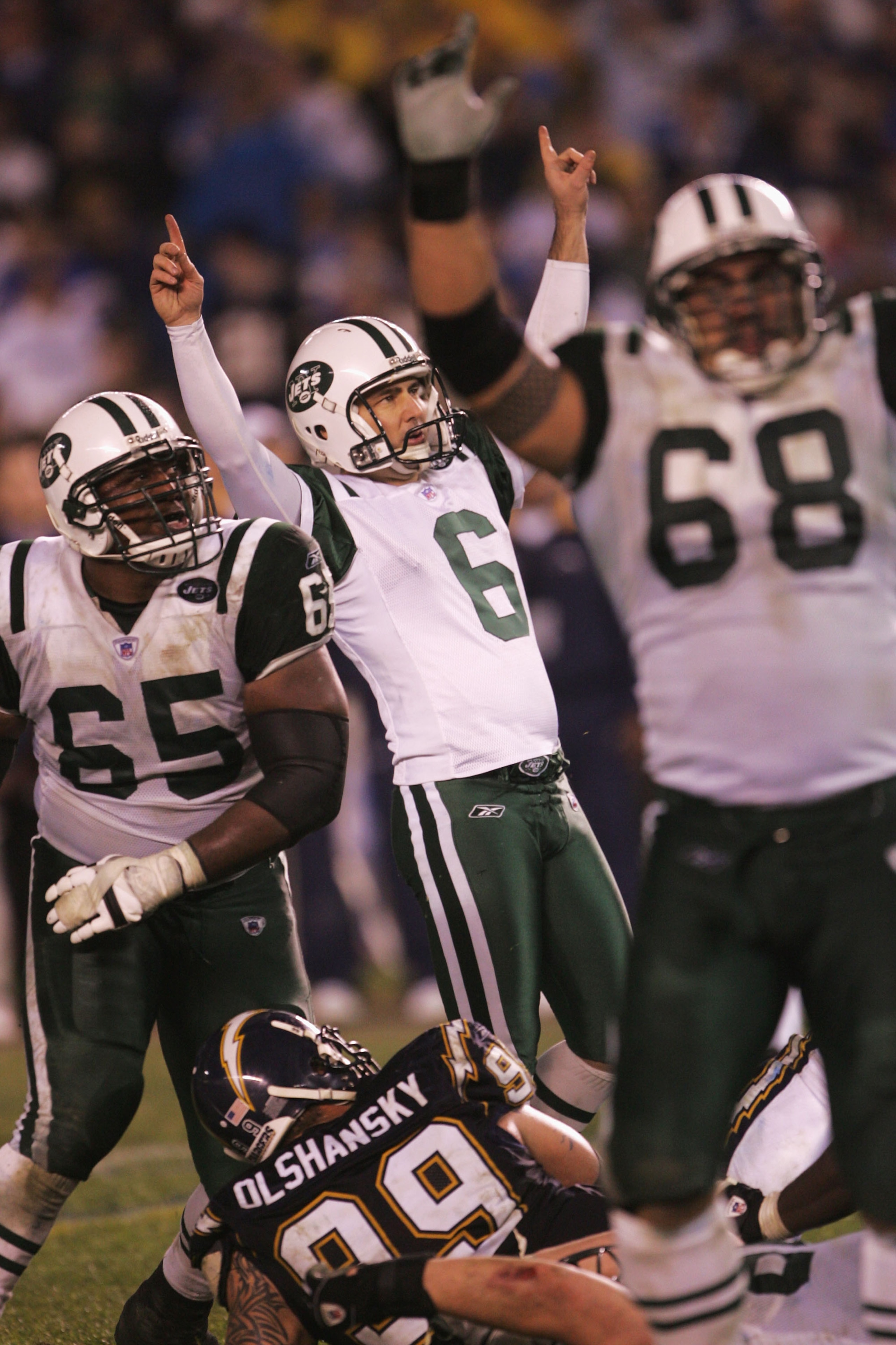 SAN DIEGO - JANUARY 08:  Kicker Doug Brien #6 of the New York Jets celebrates after kicking the game winning field goal in overtime against the San Diego Chargers during the AFC wild-card game at Qualcomm Stadium on January 8, 2005 in San Diego, Californi