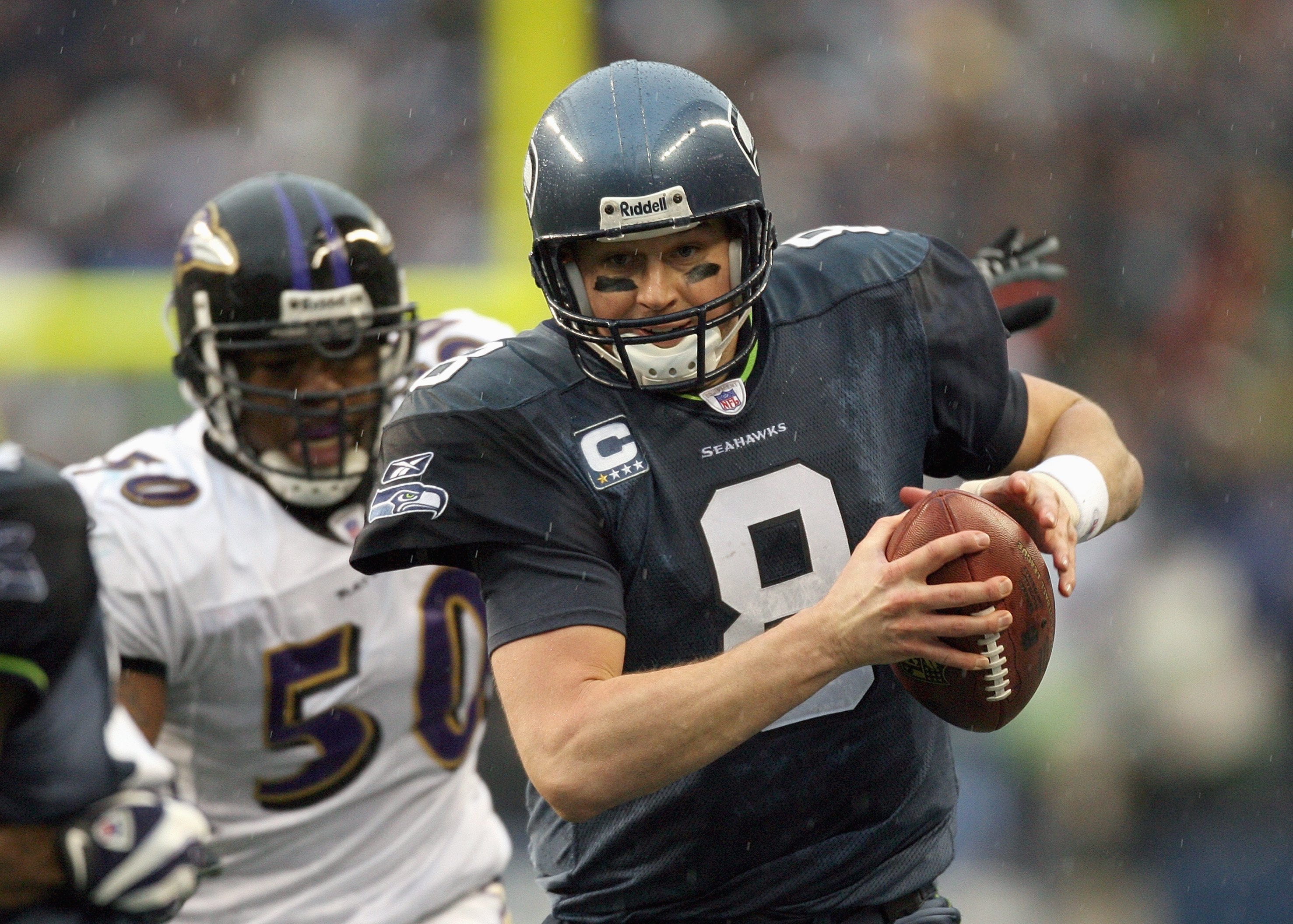 SEATTLE - DECEMBER 23: Matt Hasselbeck #8 of the Seattle Seahawks runs the ball during the game against the Baltimore Ravens at Qwest Field on December 23, 2007 in Seattle, Washington. The Seahawks defeated the Ravens 27-6. (Photo by Otto Greule Jr/Getty